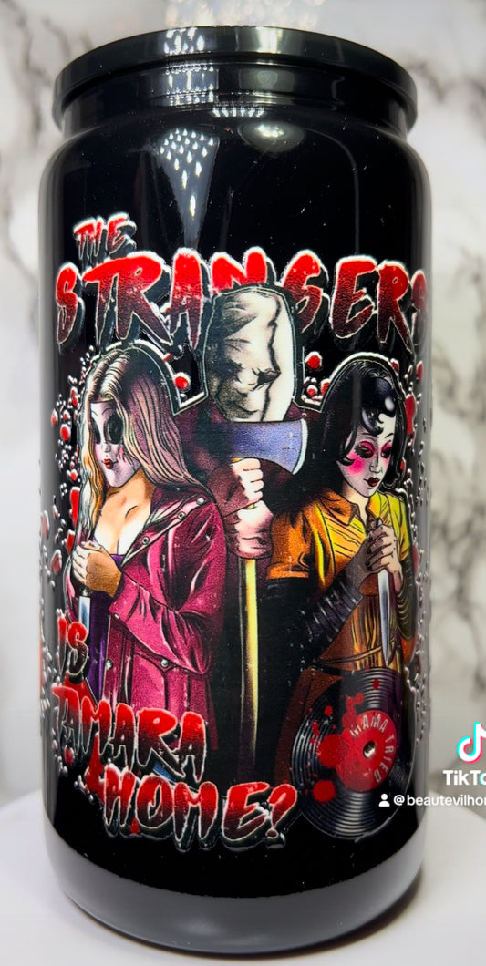 The Strangers UVDTF on a black beer can glass
