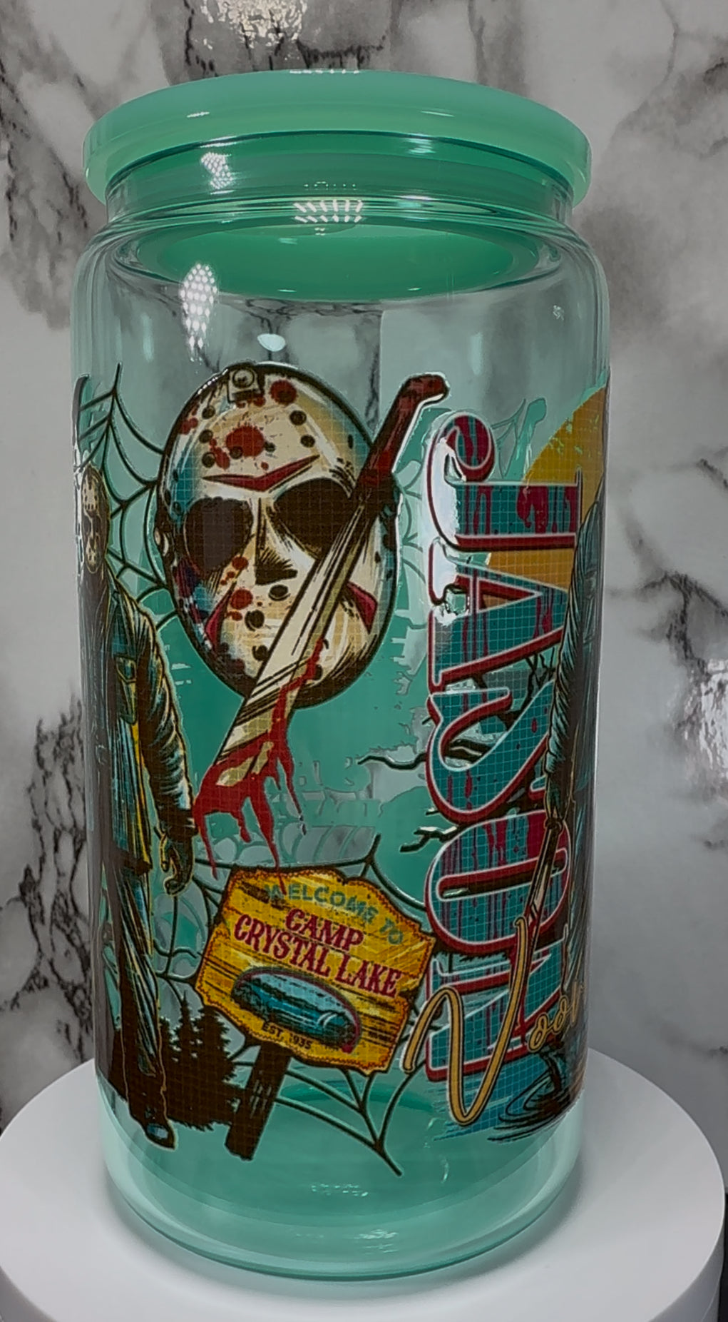 Friday the 13th Jason Voorhees UVDTF on a teal beer can glass