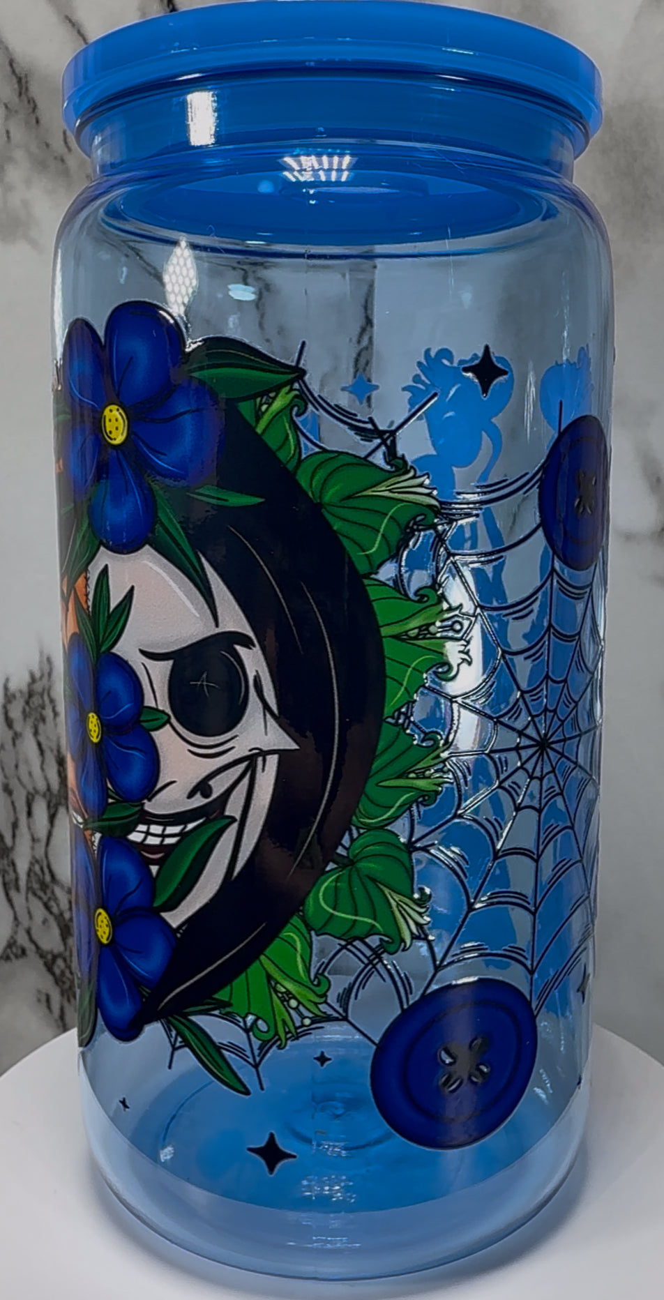 Coraline Other Mother UVDTF on a blue PLASTIC beer can cup