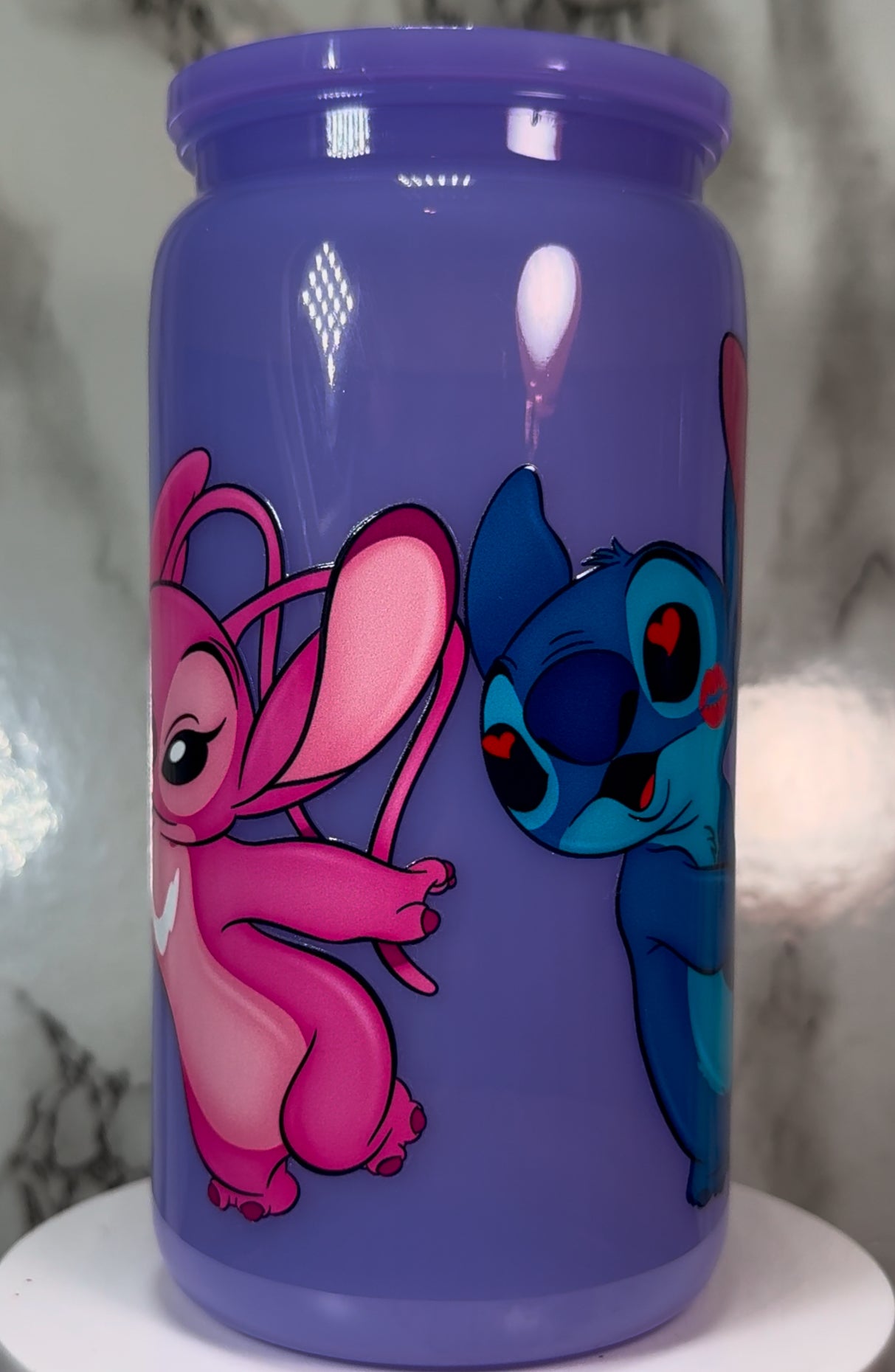 Stitch & Angel Polaroid UVDTF on a plastic purple beer can cup