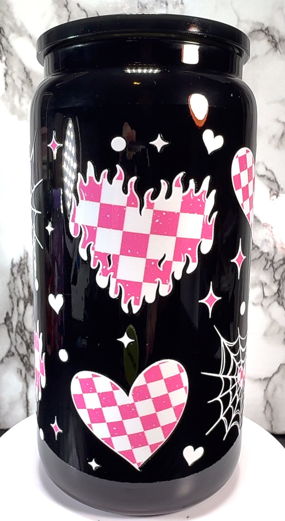 Pink & White checkered hearts UVDTF on a black beer can glass