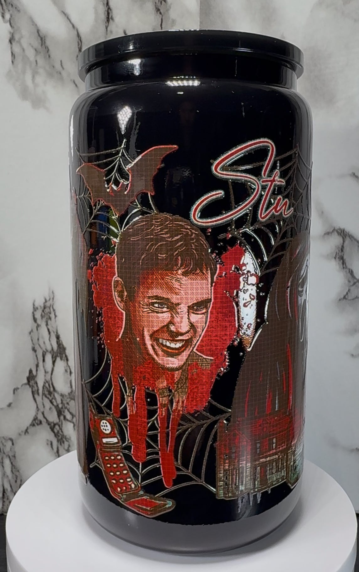 Scream Movie Ghostface UVDTF on a black beer can glass