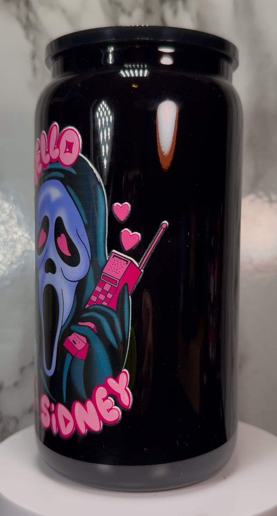 Hello Sidney Ghostface UVDTF on a black beer can glass