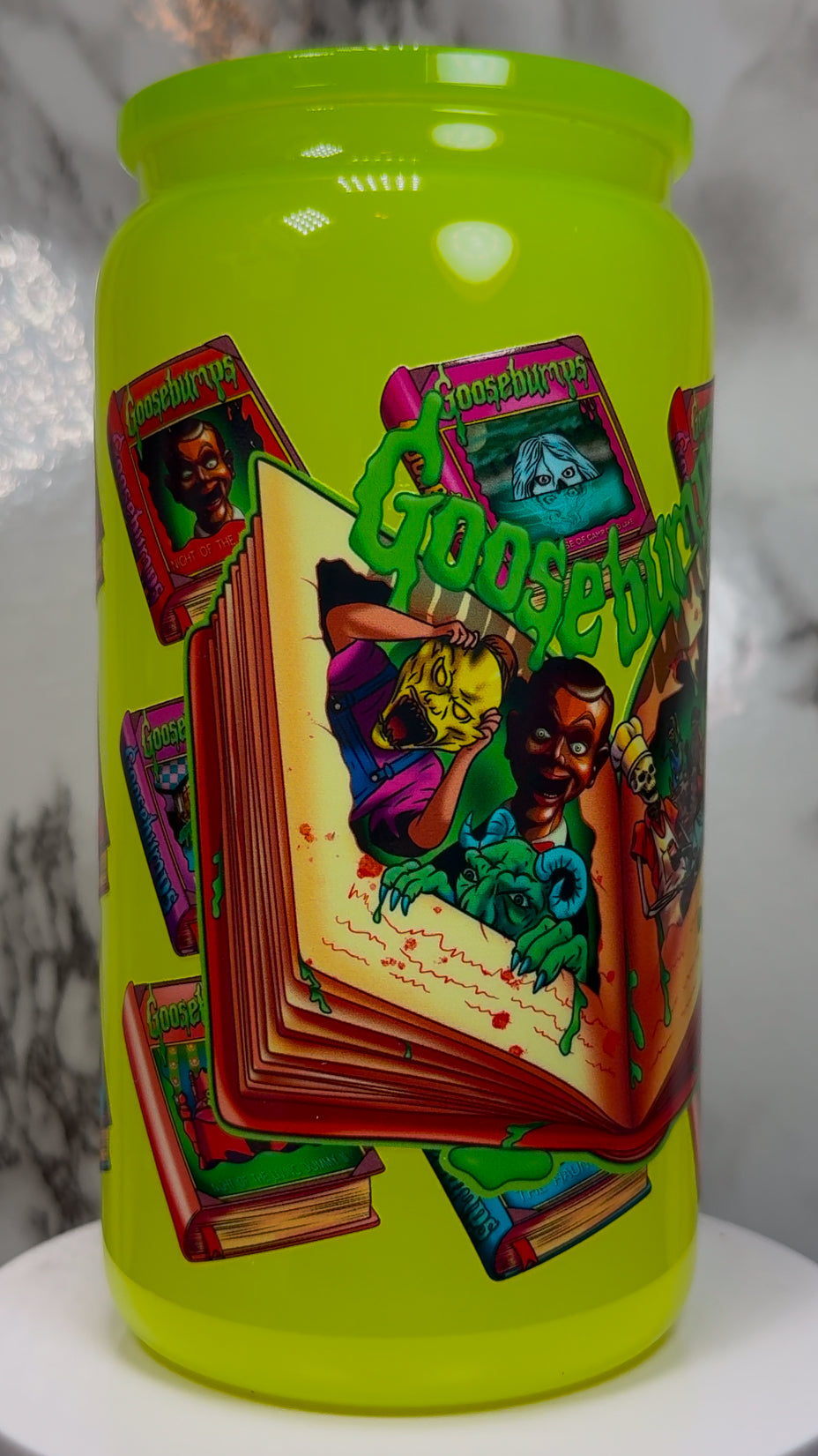Goosebumps UVDTF on a highlighter yellow beer can glass