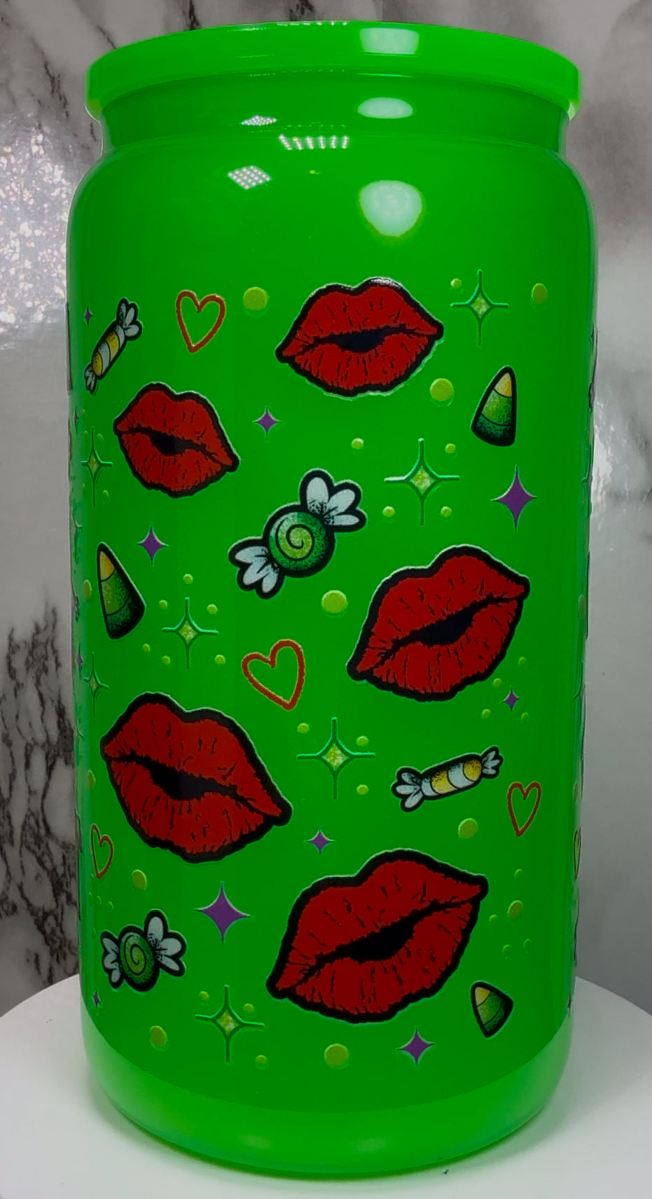 Greta Gremlin UVDTF in a bright green beer can glass