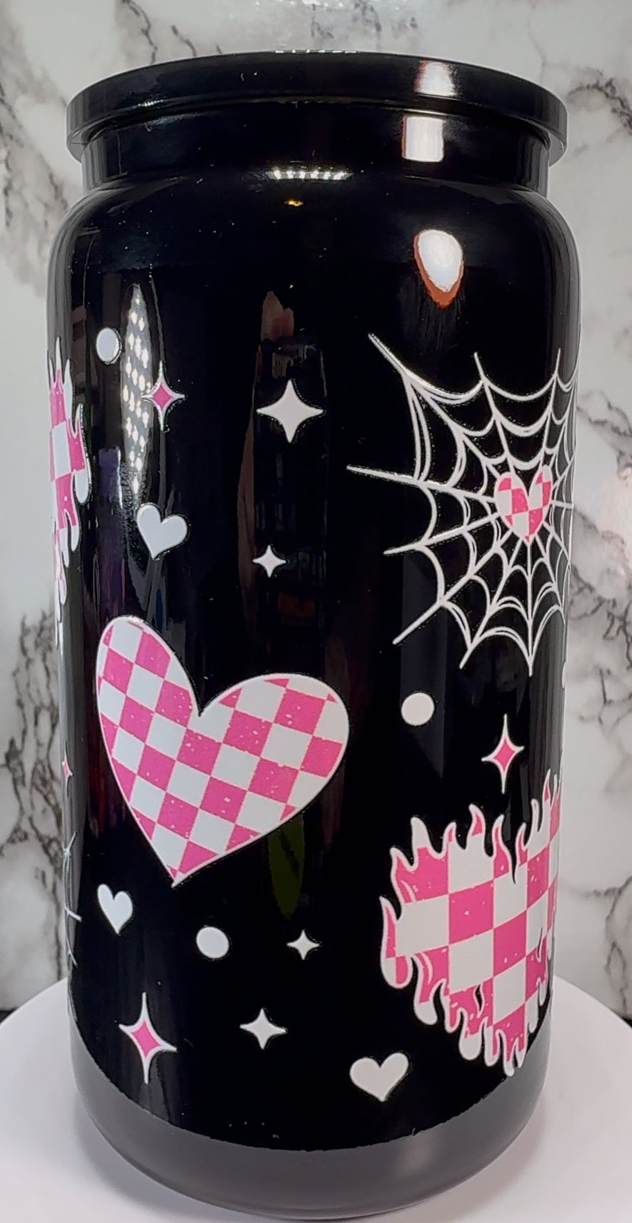 Pink & White checkered hearts UVDTF on a black beer can glass