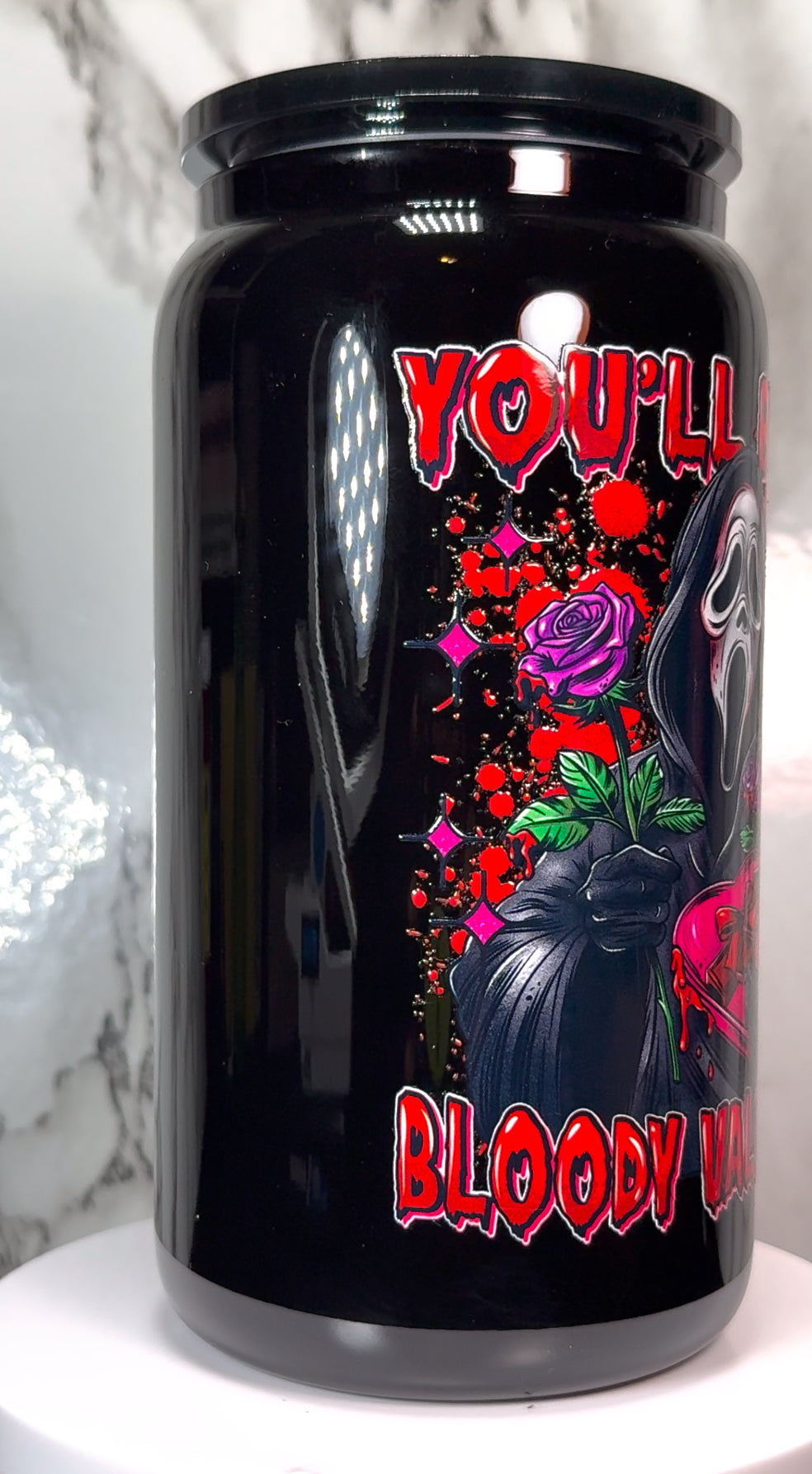 Valentine Ghostface UVDTF on a black beer can glass