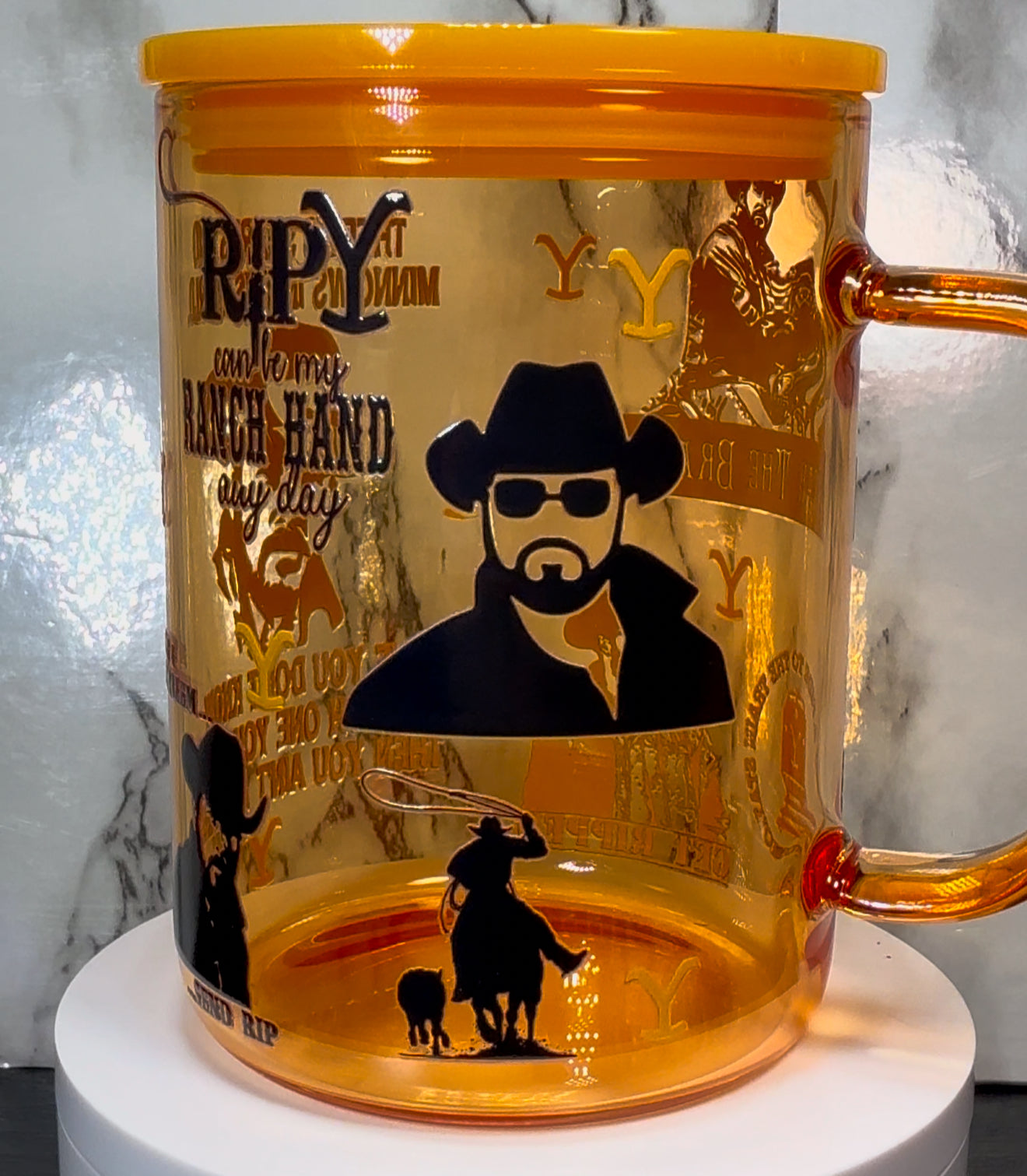 Yellowstone Rip UVDTF on a yellow 17oz glass mug