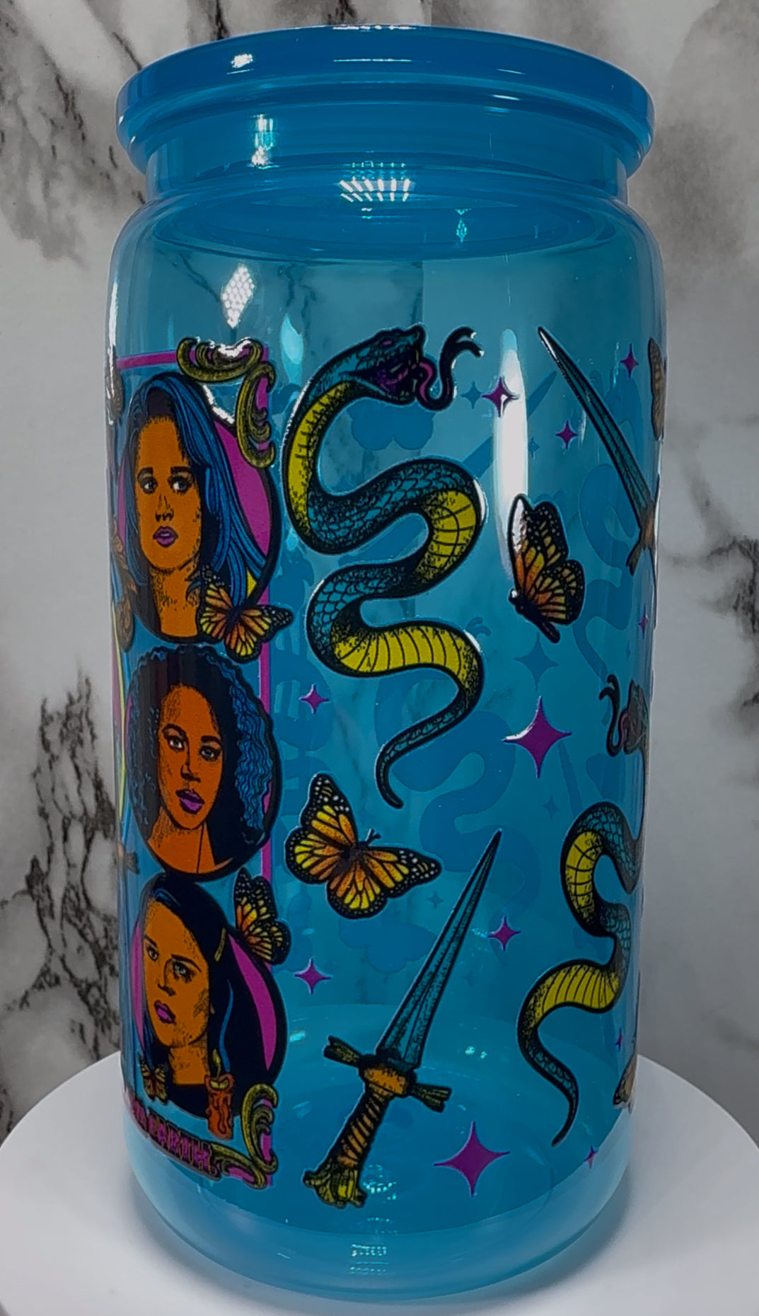 The Craft We Are The Weirdos Mister UVDTF on a bright blue PLASTIC beer can cup