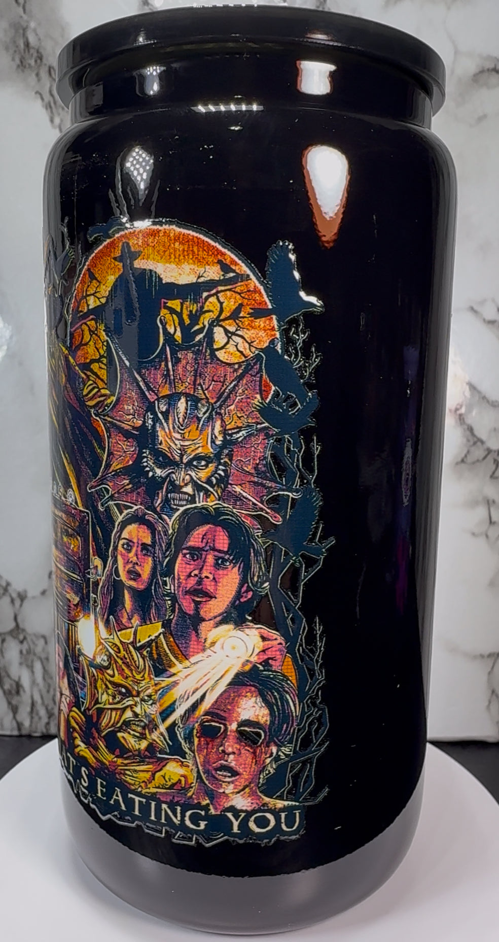 Jeepers Creepers UVDTF on a black beer can glass