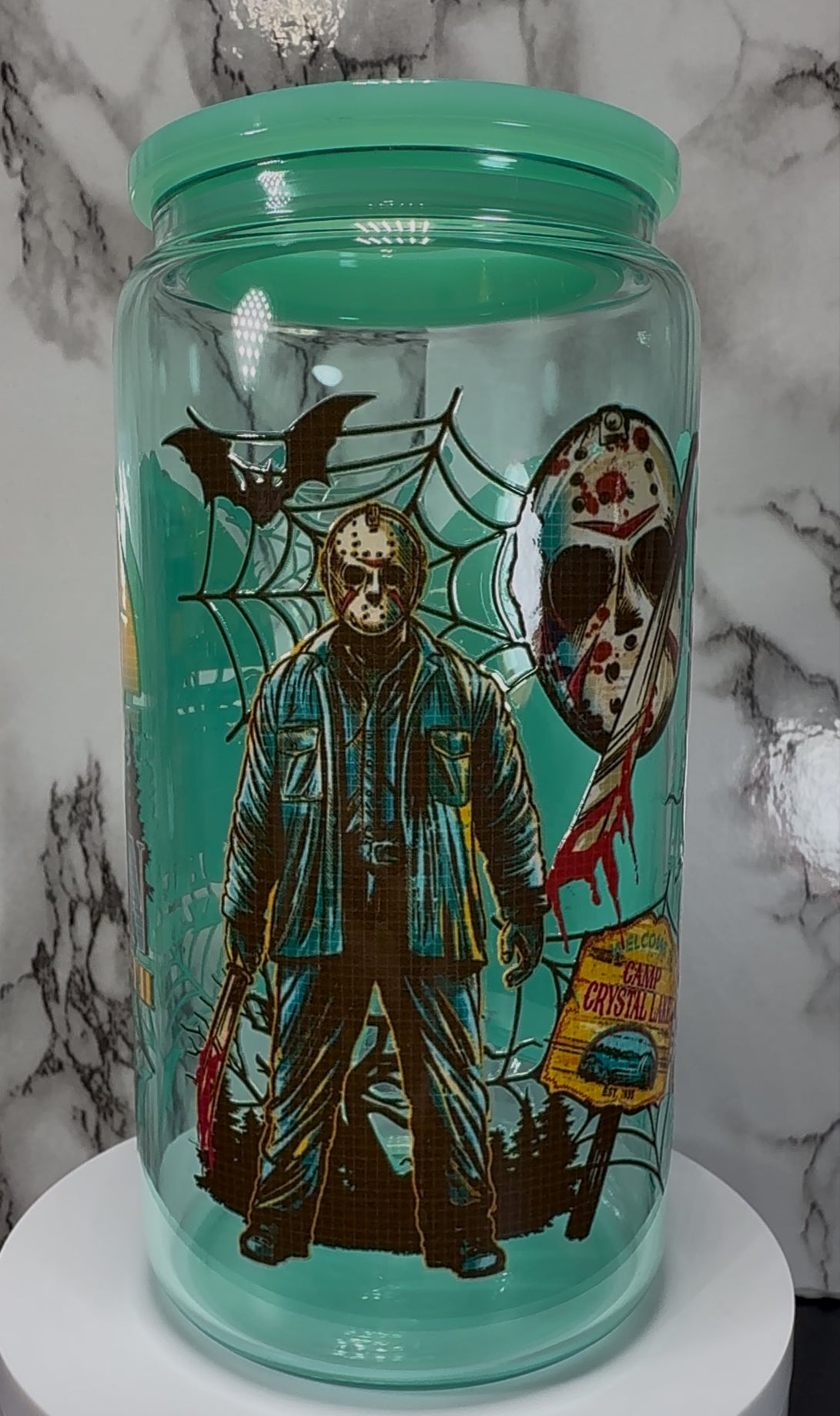 Friday the 13th Jason Voorhees UVDTF on a teal beer can glass