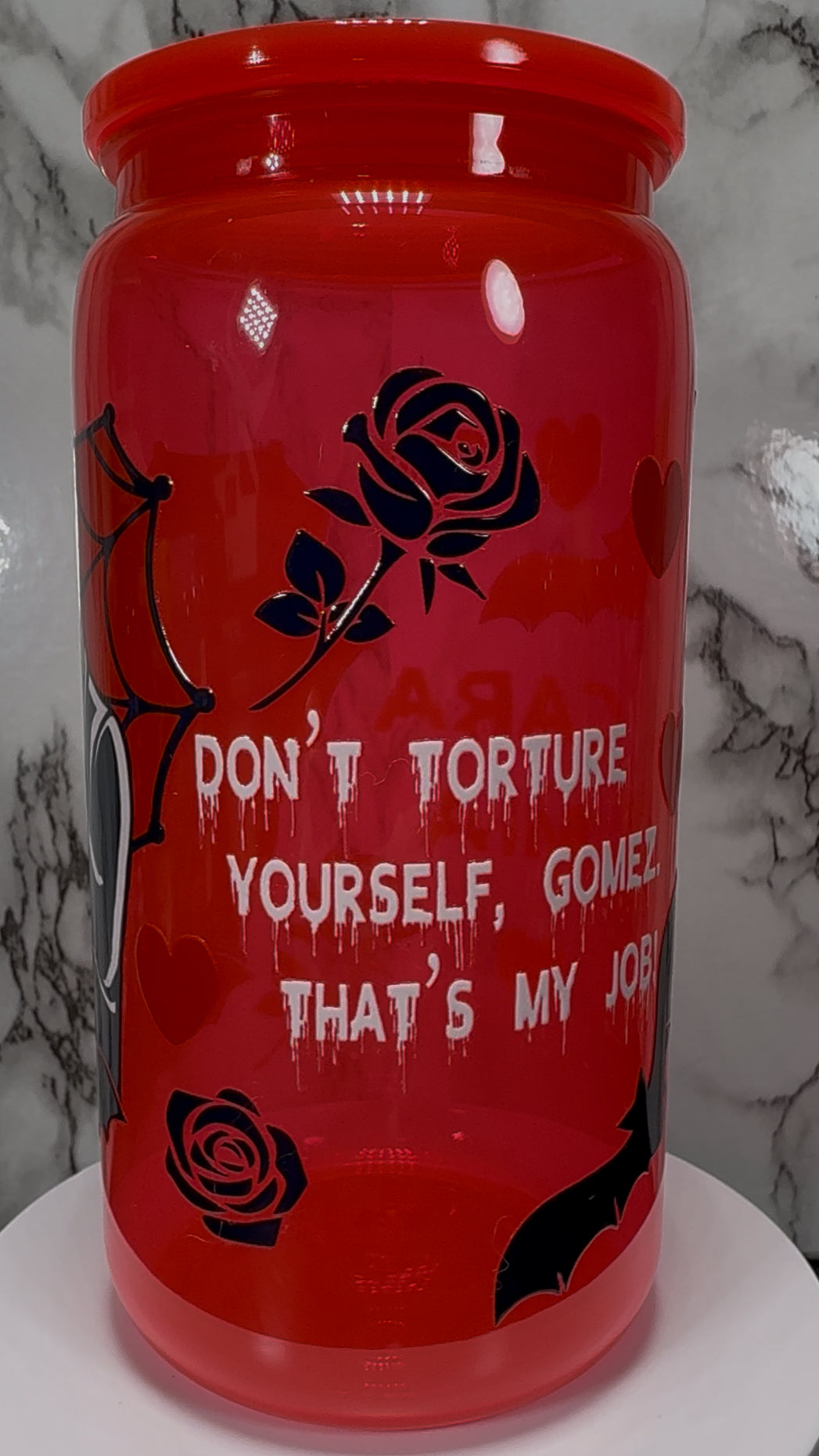 Gomez and Morticia Addams from Addams Family UVDTF on a bright red PLASTIC beer cancup