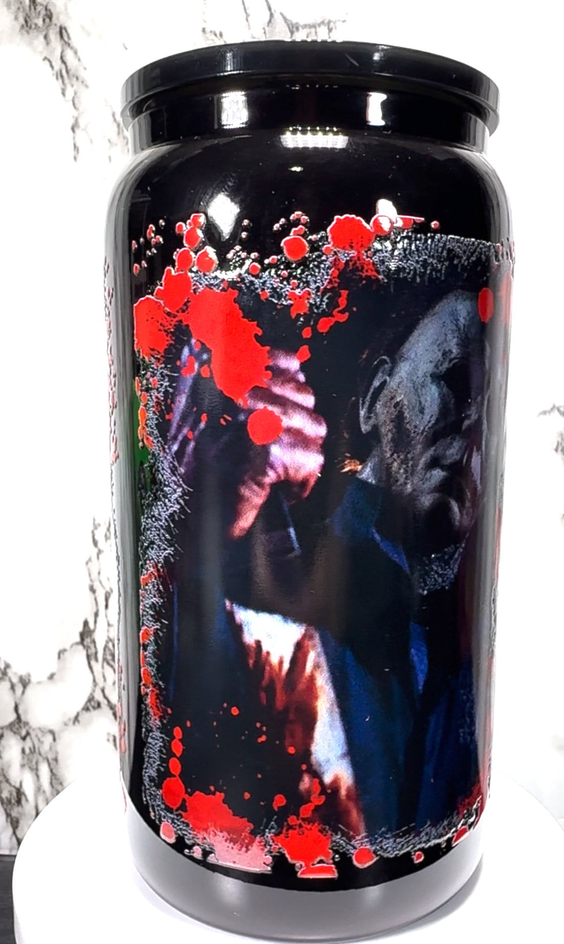 Michael Myers UVDTF on a black beer can glass