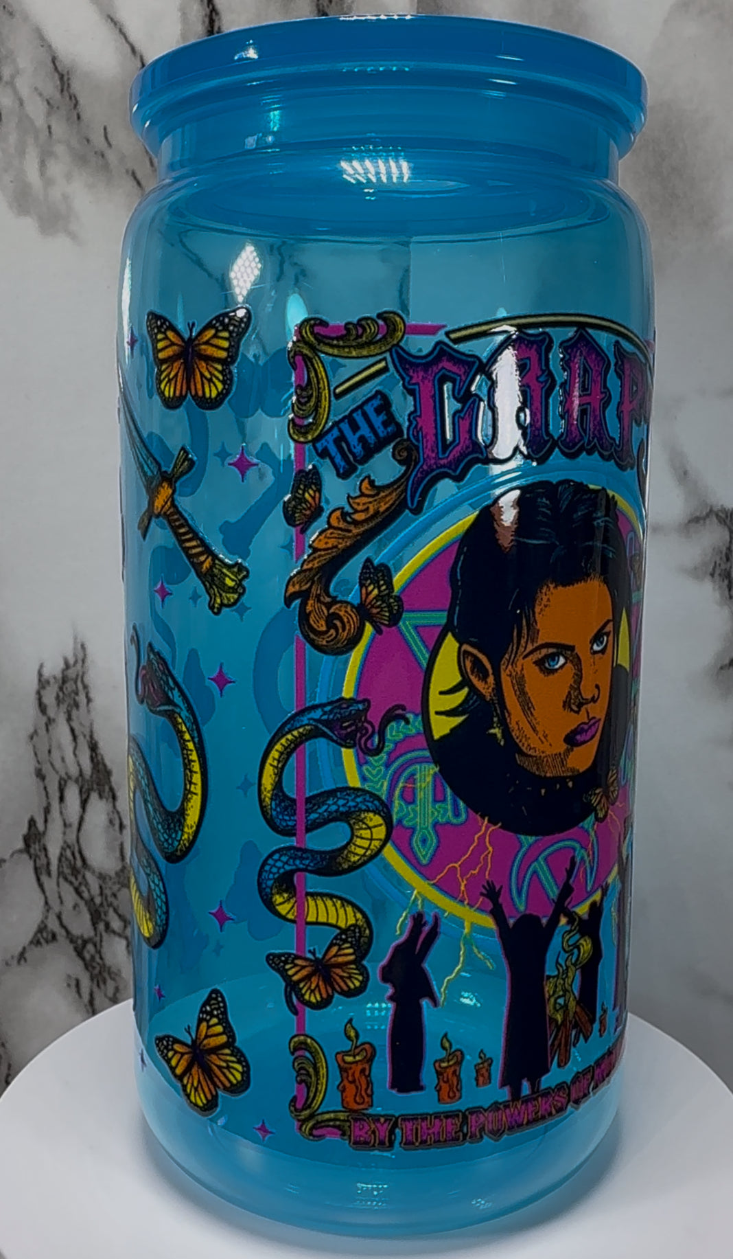 The Craft We Are The Weirdos Mister UVDTF on a bright blue PLASTIC beer can cup