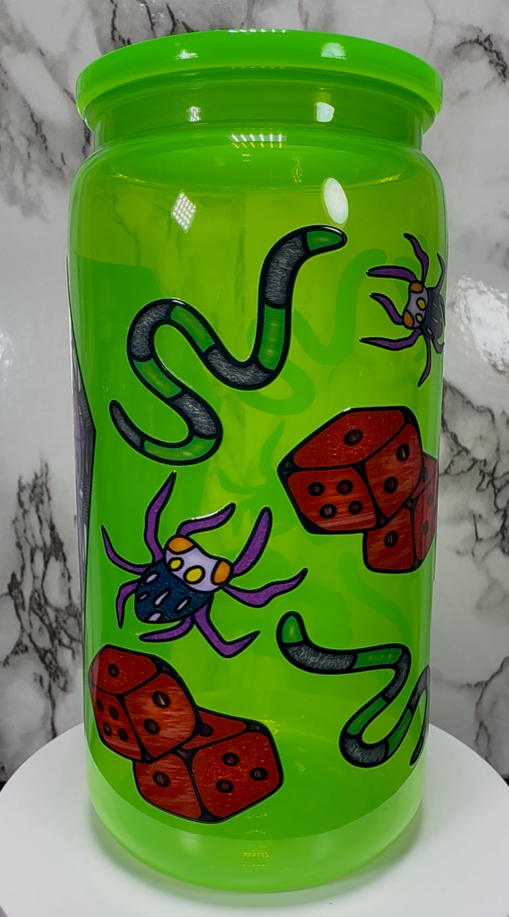 Oogie Boogie UVDTF on a bright green PLASTIC beer can cup