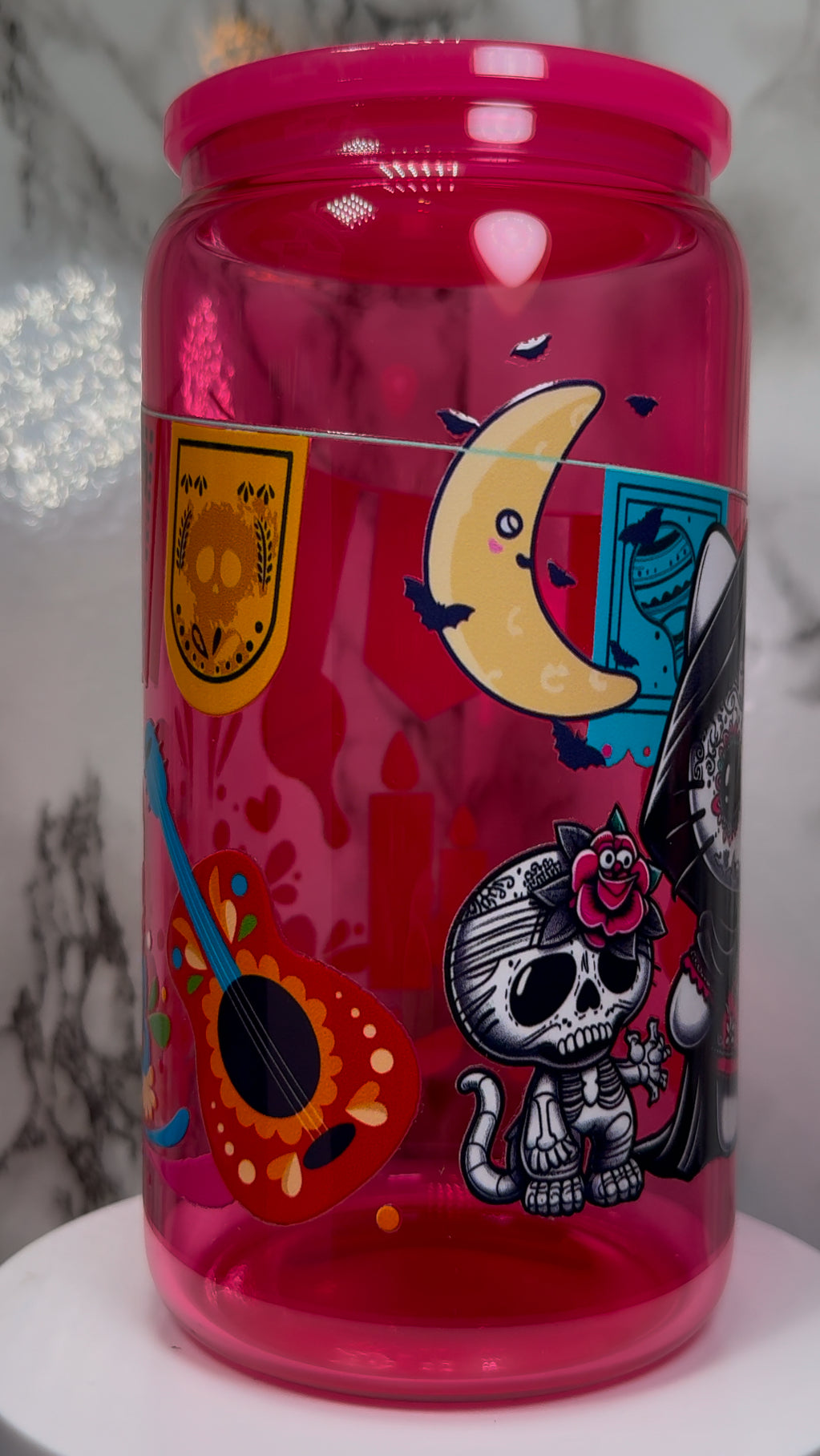 Dia De Los Muertos Hello Kitty UVDTF on a hot pink beer can glass