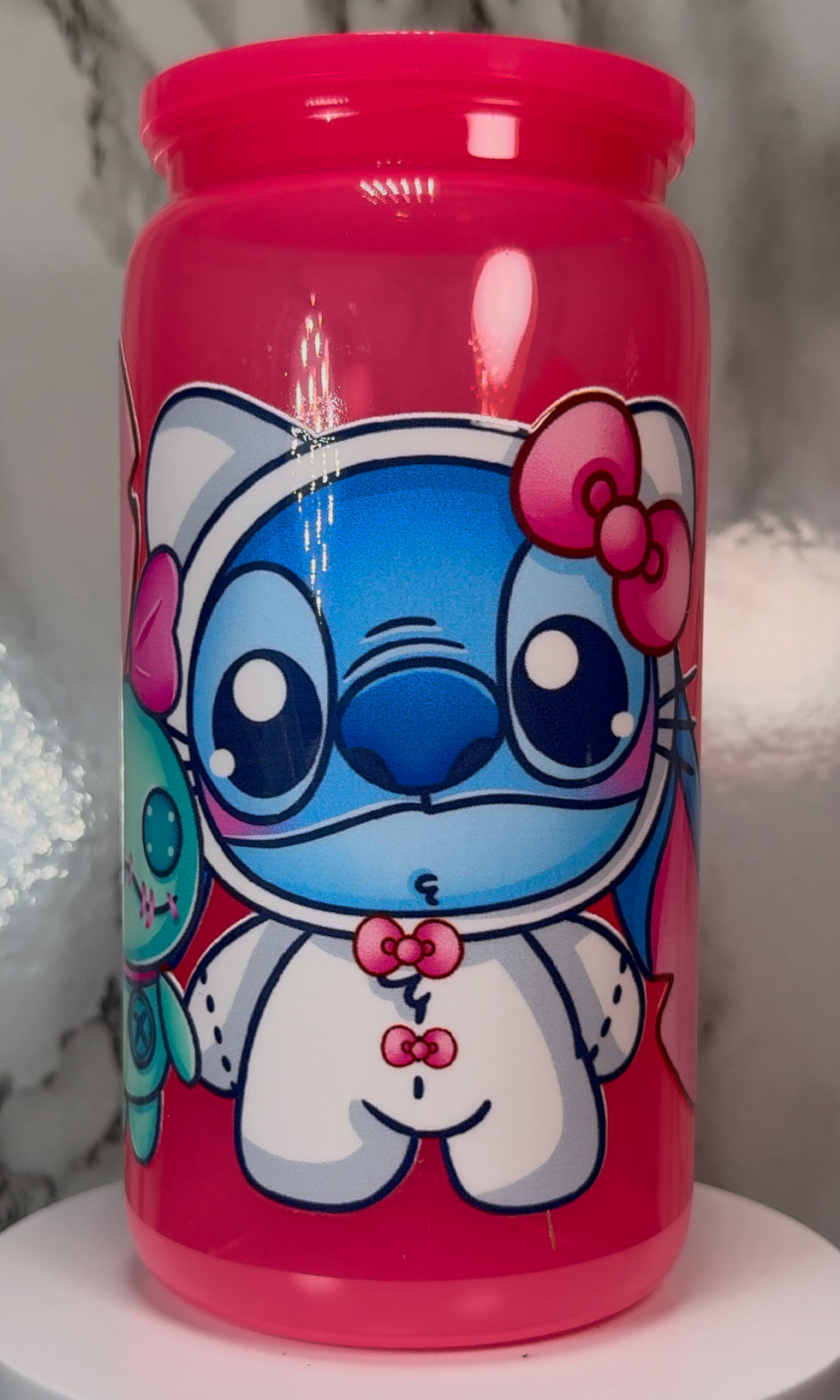 Hello Kitty-Stitch Mash Up UVDTF on a hot pink plastic beer can cup