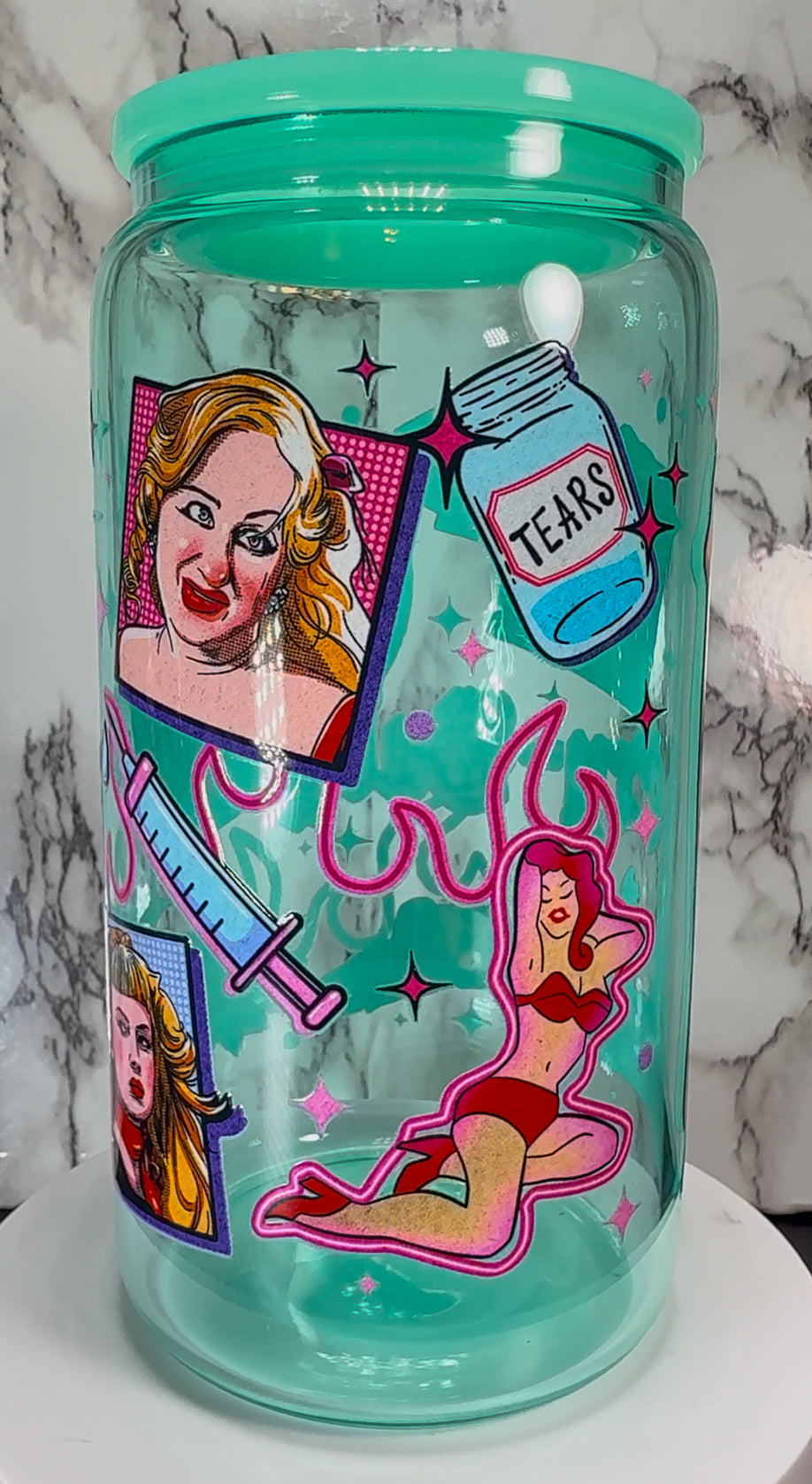 Cry Baby UVDTF on a teal beer can glass