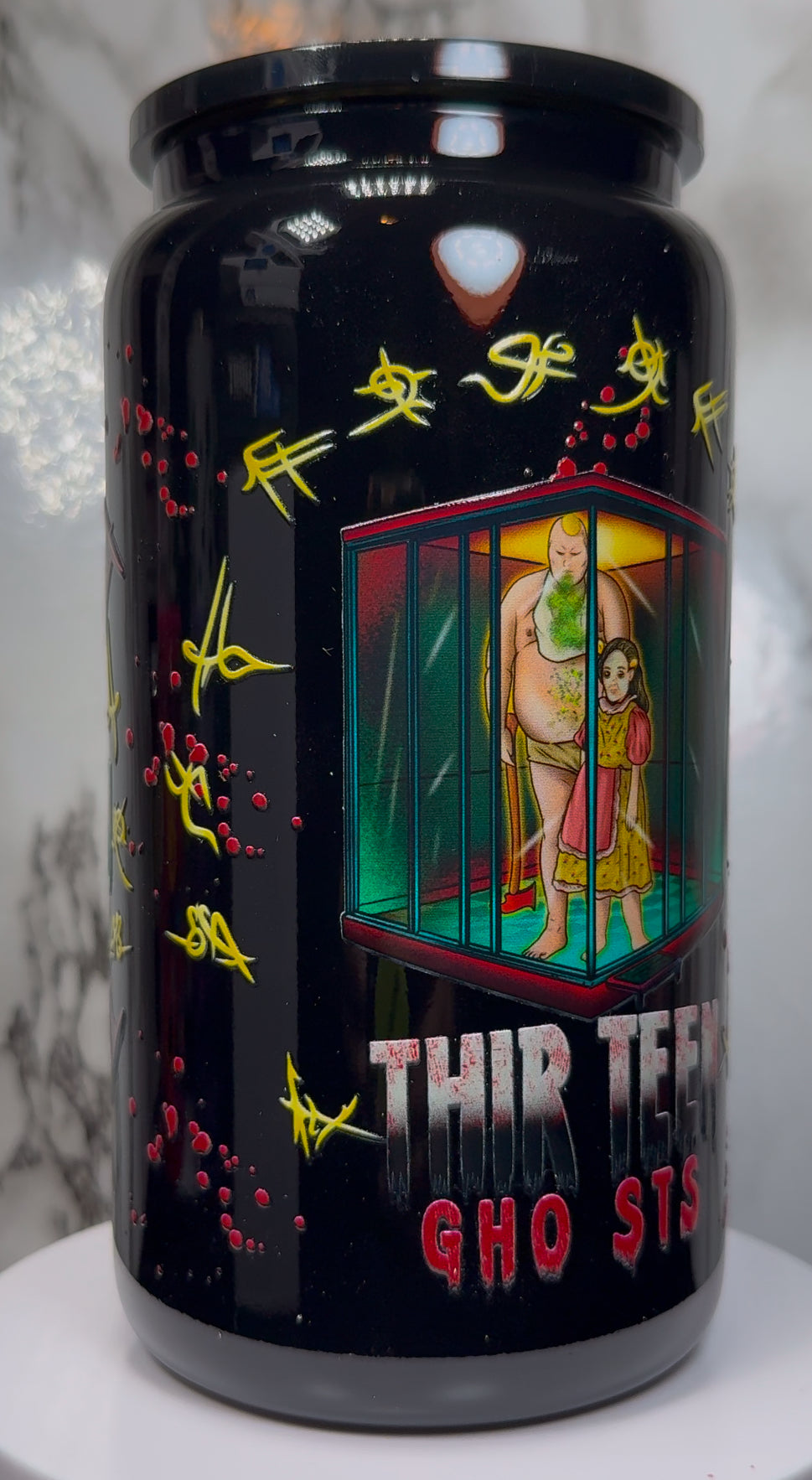 13 Ghosts Angry Princess UVDTF on a black beer can glass