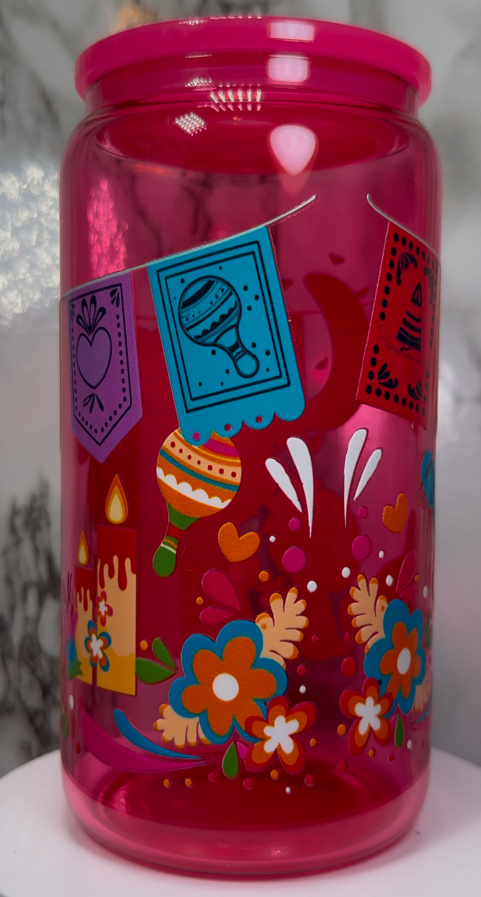 Dia De Los Muertos Hello Kitty UVDTF on a hot pink beer can glass