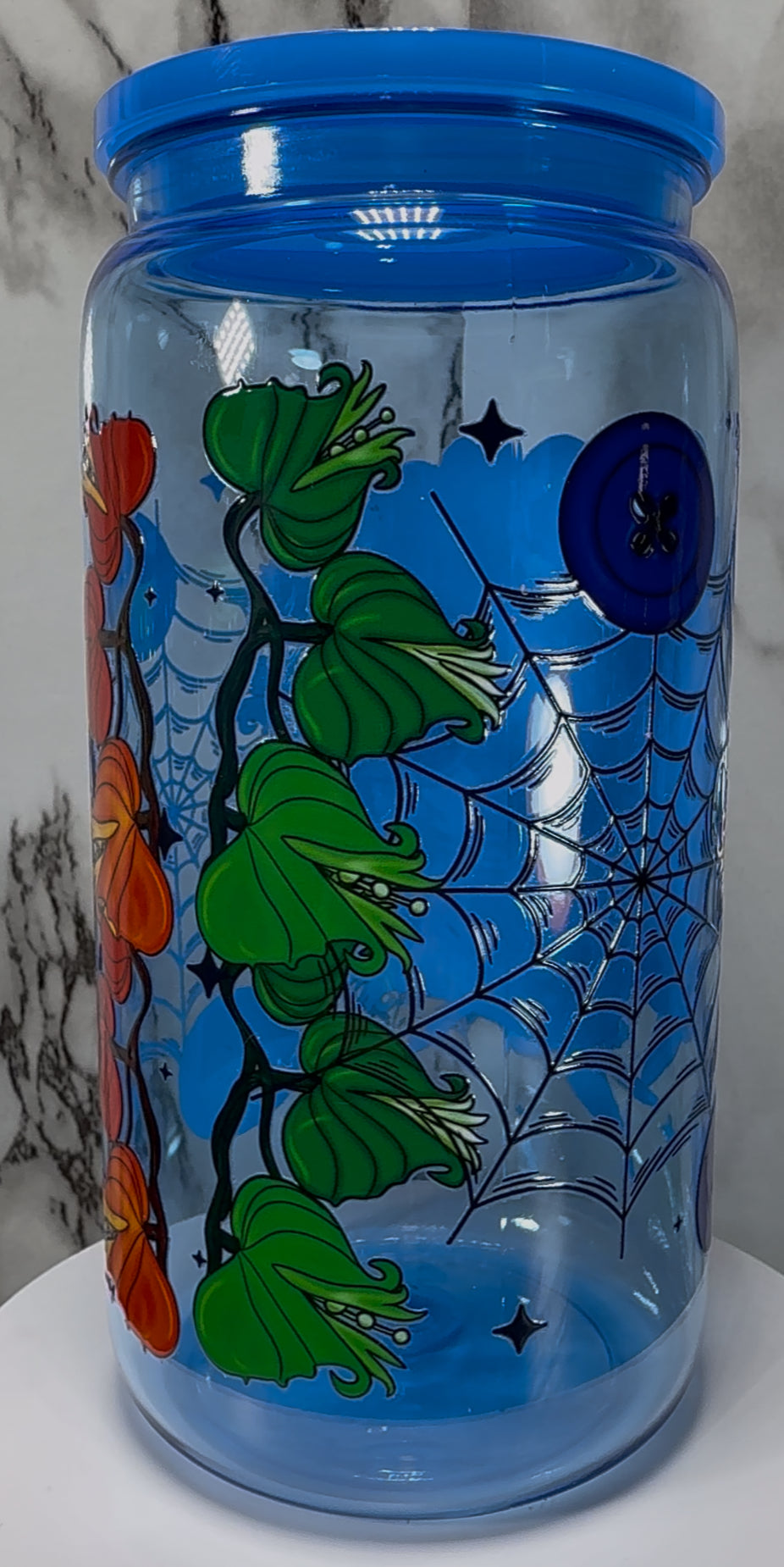 Coraline Other Mother UVDTF on a blue PLASTIC beer can cup