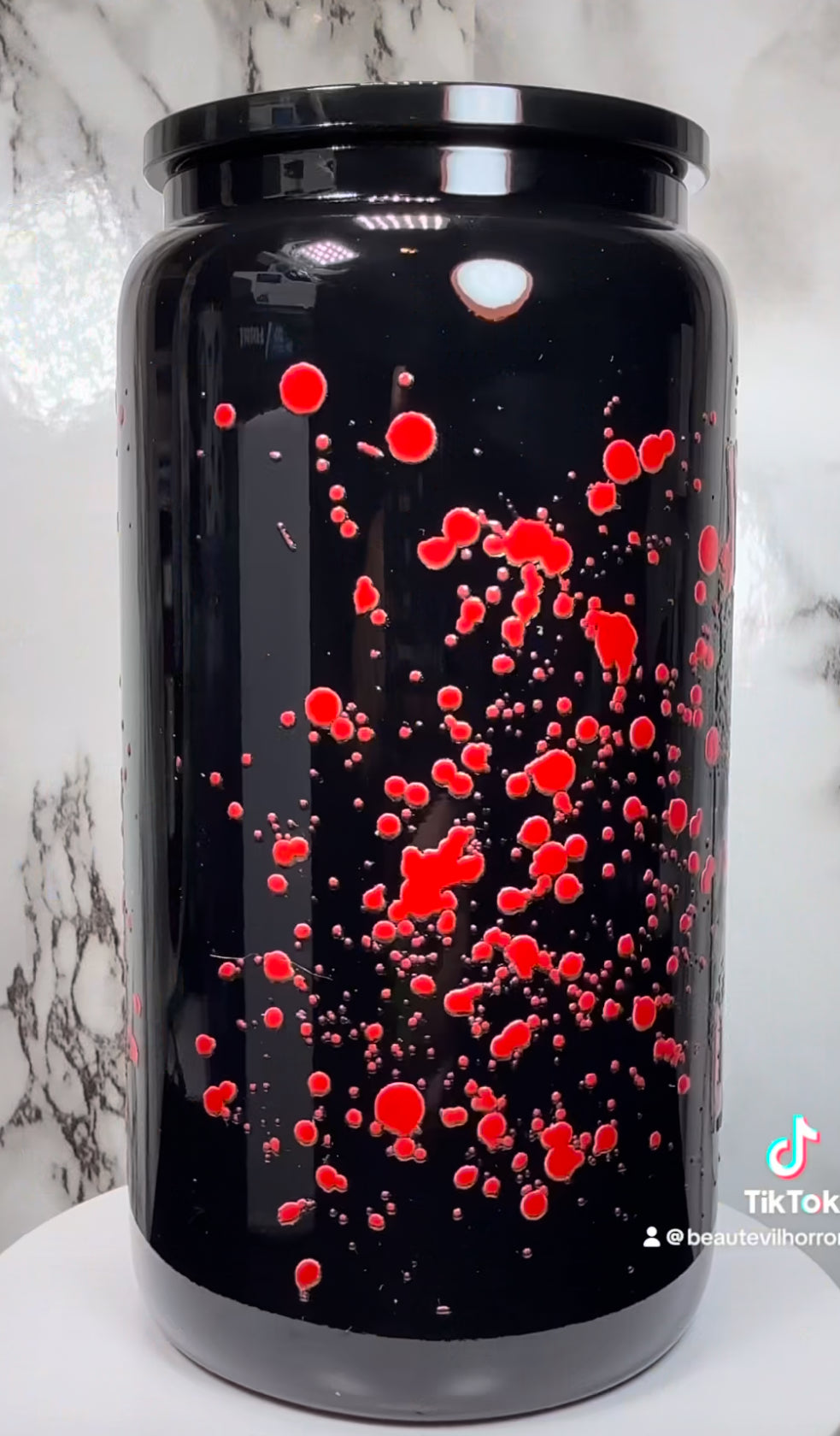 Stu Macher I’m Feeling Woozy Here UVDTF on a black beer can glass