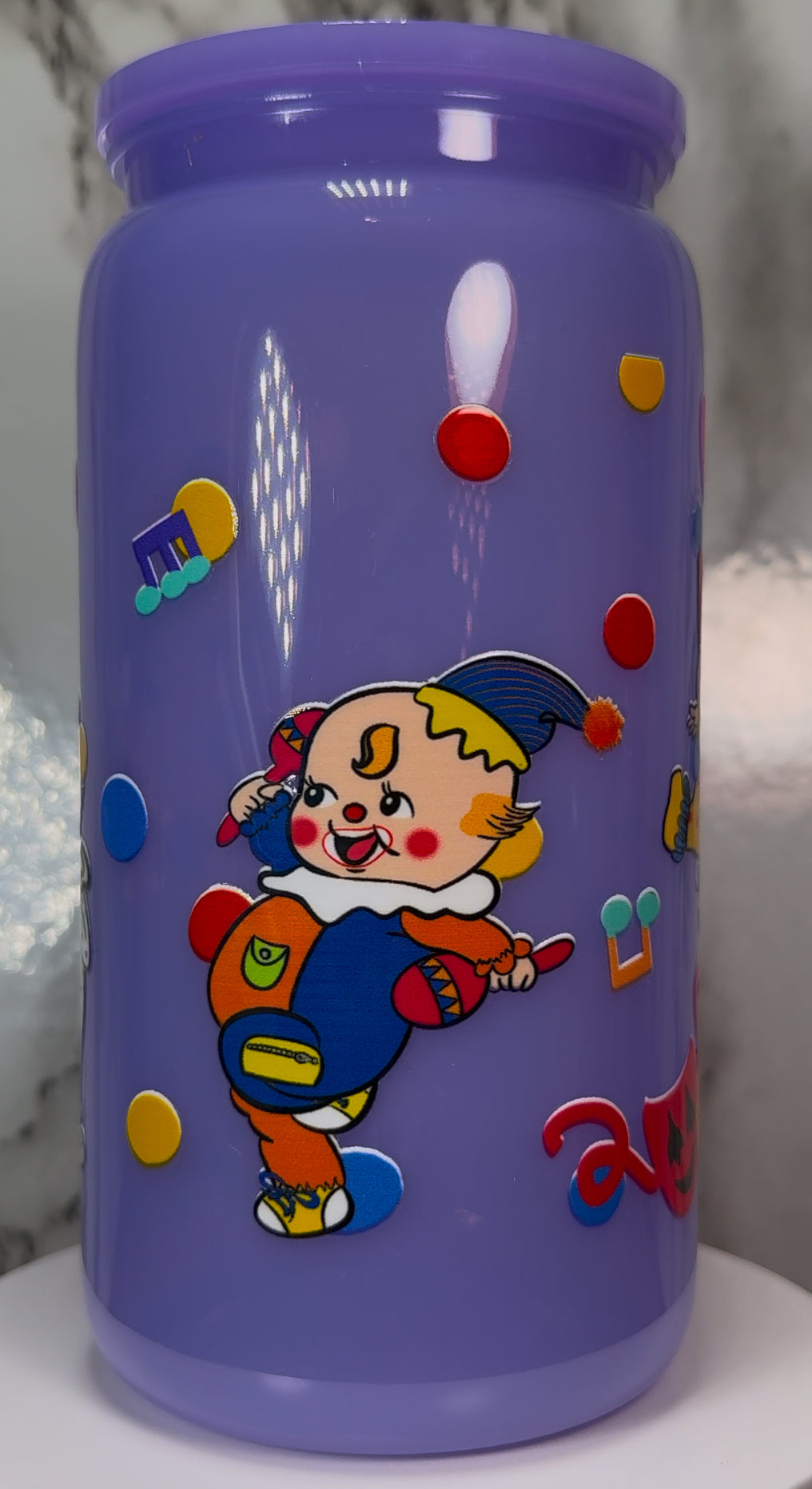 Classic Vintage Circus Clowns UVDTF on a plastic purple cup