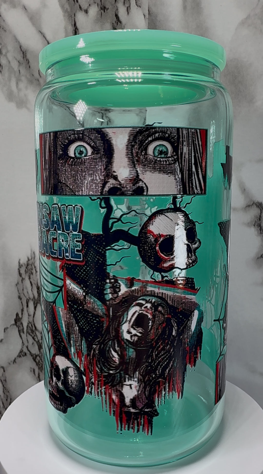 Texas Chainsaw Massacre Leatherface UVDTF on a teal beer can glass