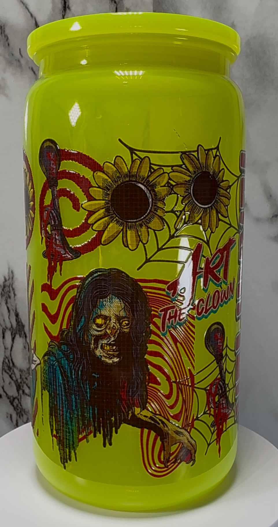 Terrifier UVDTF on a bright yellow PLASTIC beer can cup