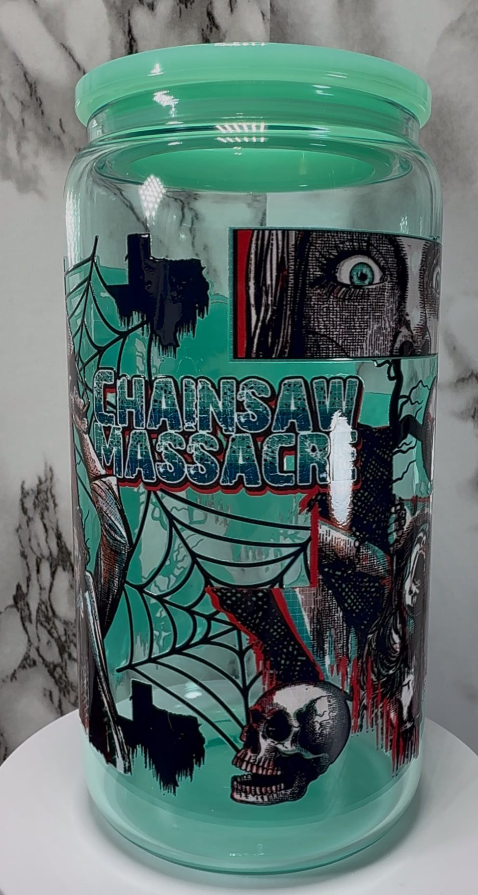Texas Chainsaw Massacre Leatherface UVDTF on a teal beer can glass