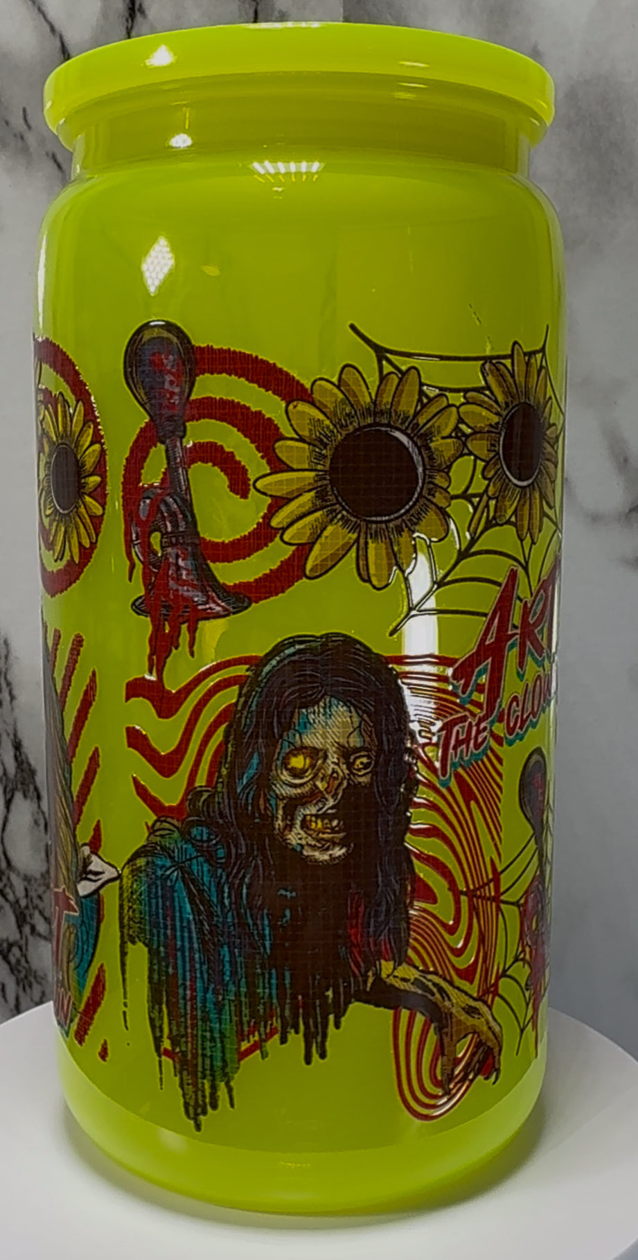 Terrifier UVDTF on a bright yellow PLASTIC beer can cup