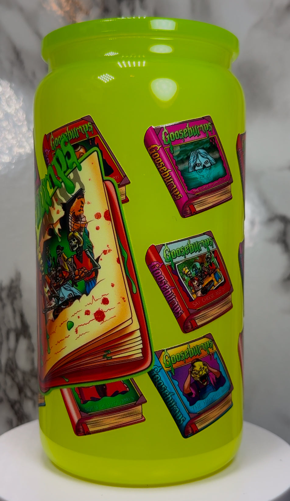Goosebumps UVDTF on a highlighter yellow beer can glass