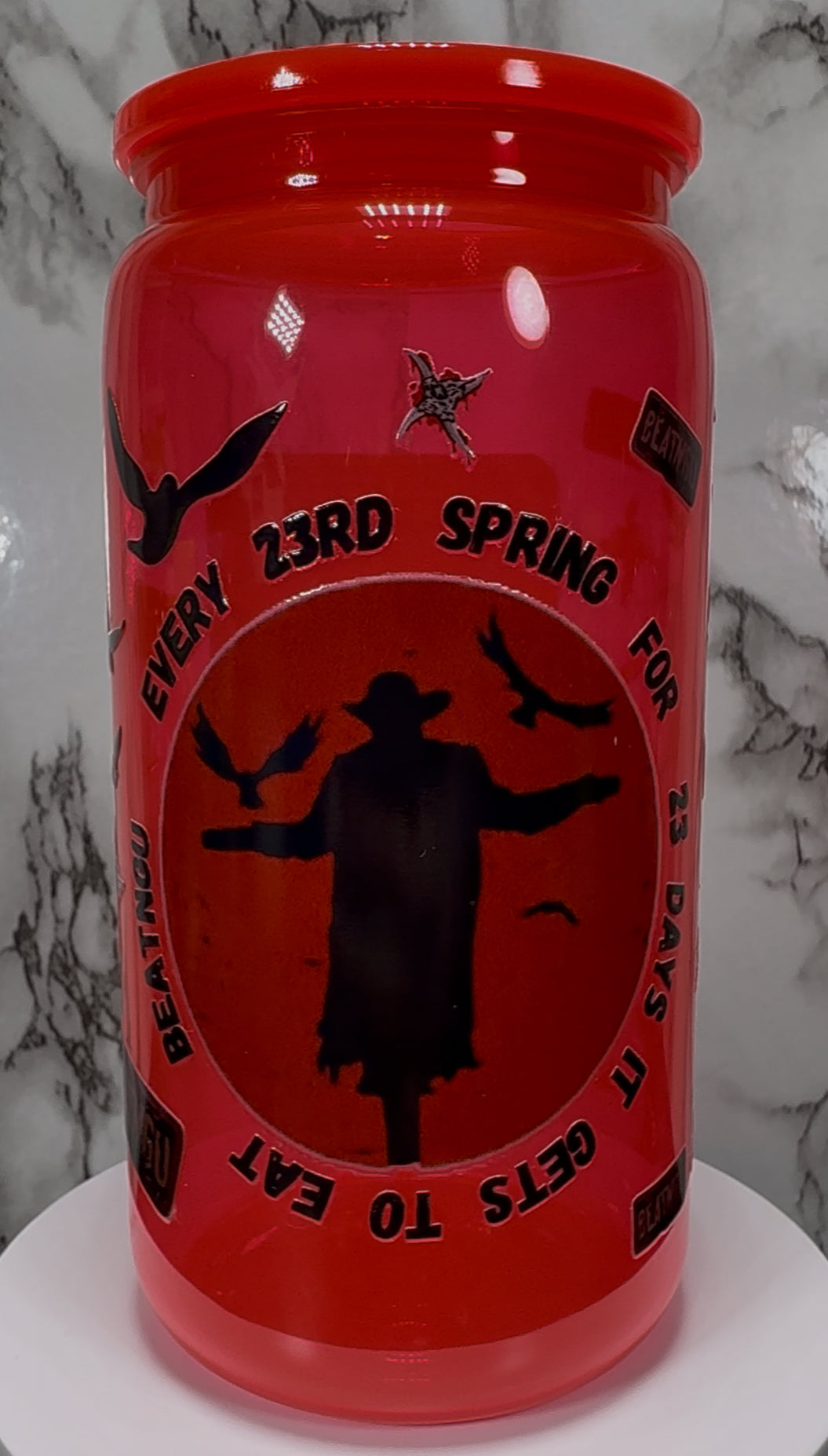 Jeepers Creepers UVDTF on a bright red PLASTIC beer can cup