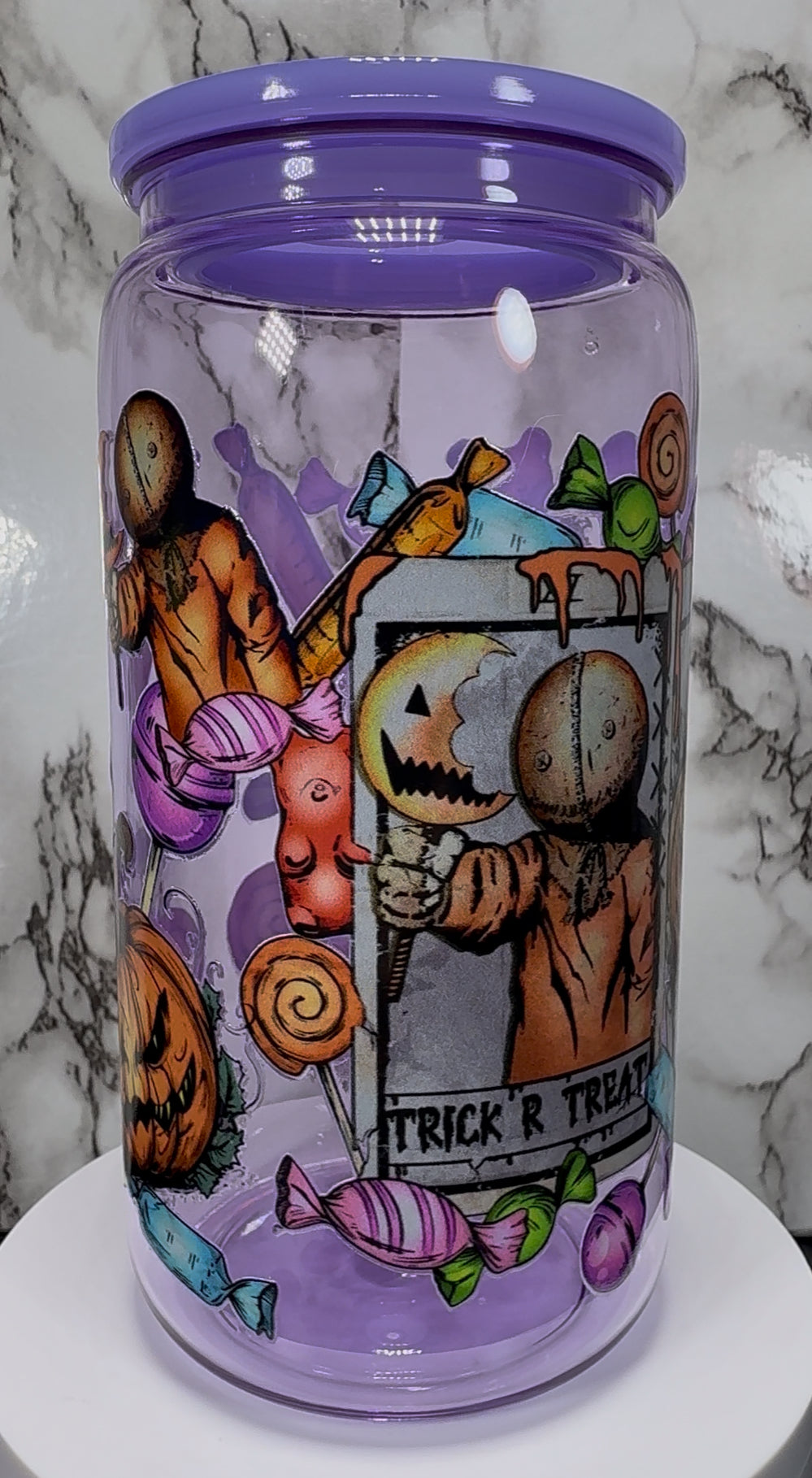 Sam Trick R Treat UVDTF on a purple PLASTIC beer can cup