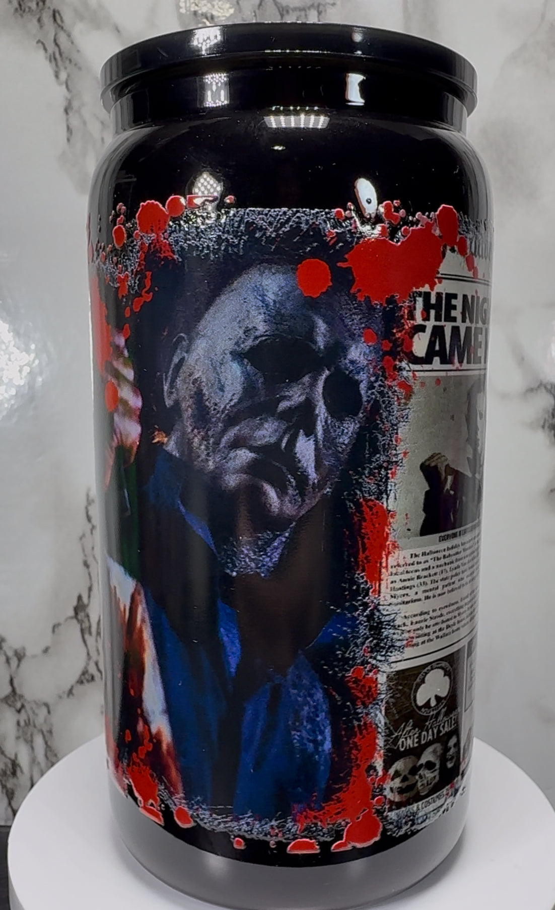 Michael Myers UVDTF on a black beer can glass