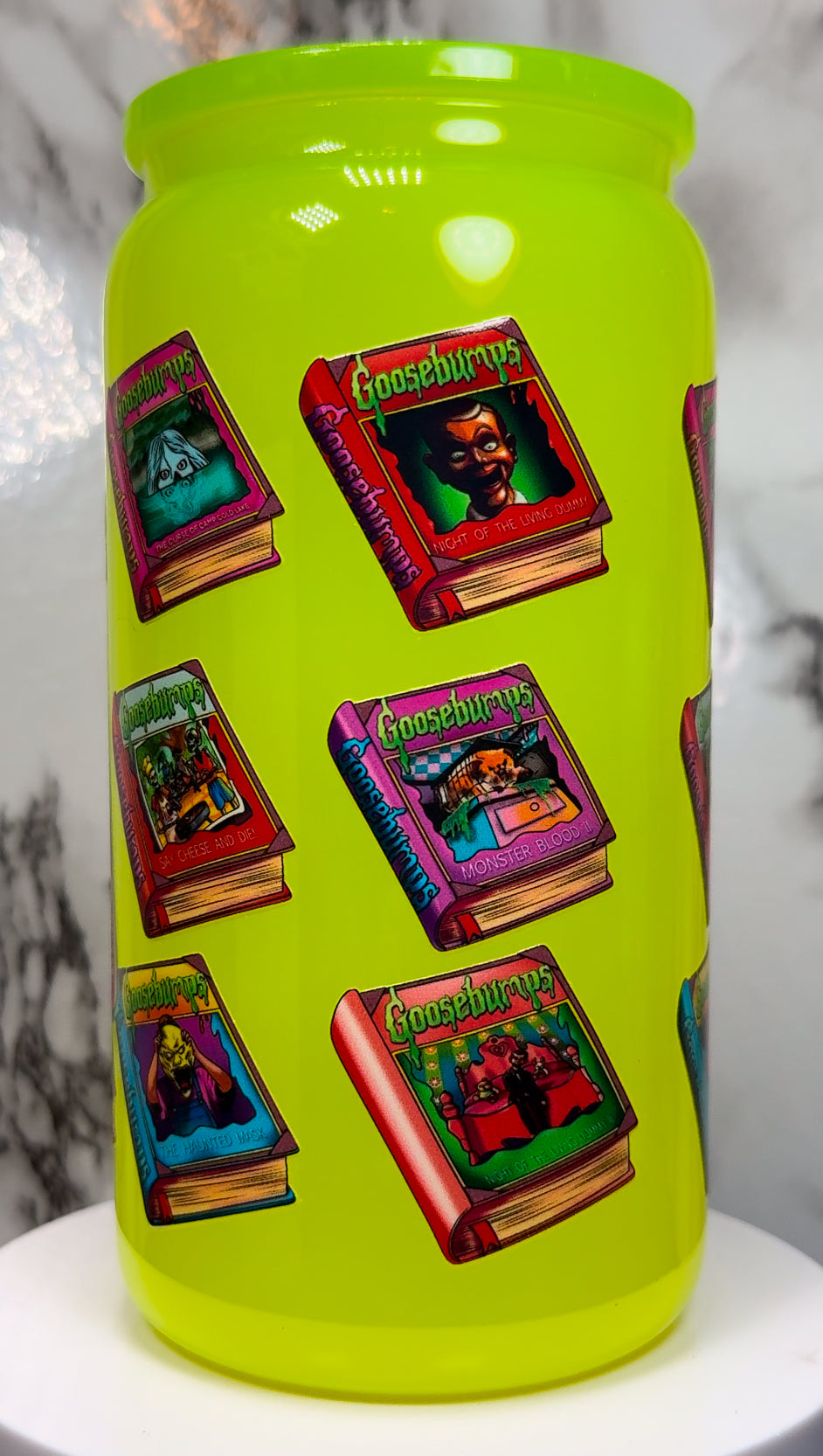 Goosebumps UVDTF on a highlighter yellow beer can glass