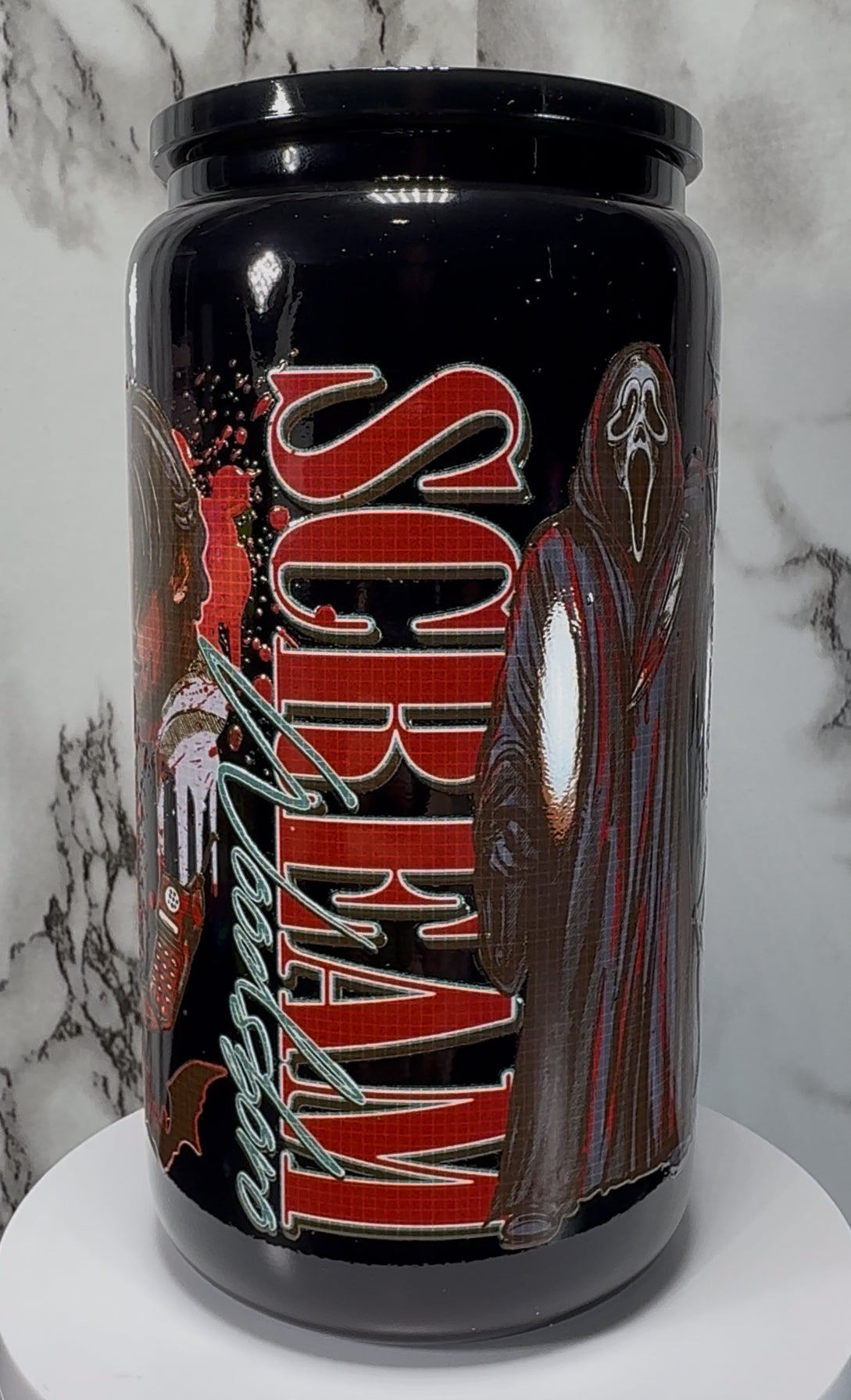 Scream Movie Ghostface UVDTF on a black beer can glass