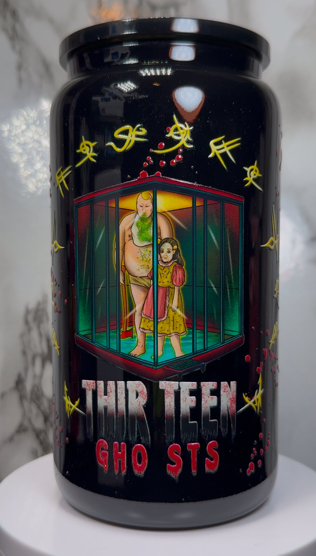 13 Ghosts Angry Princess UVDTF on a black beer can glass