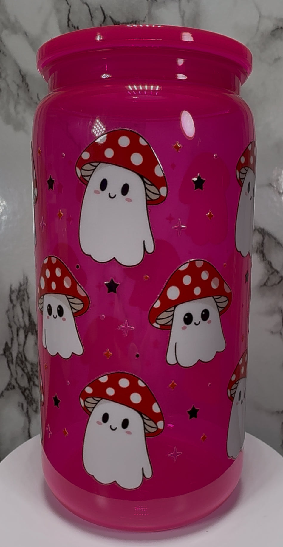 Happy Mushrooms UVDTF on a hot pink PLASTIC beer can cup