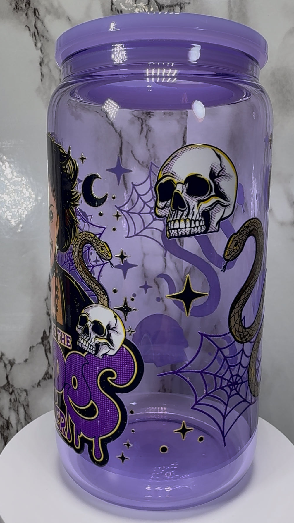 The Craft We Are The Weirdos UVDTF on a purple beer can glass