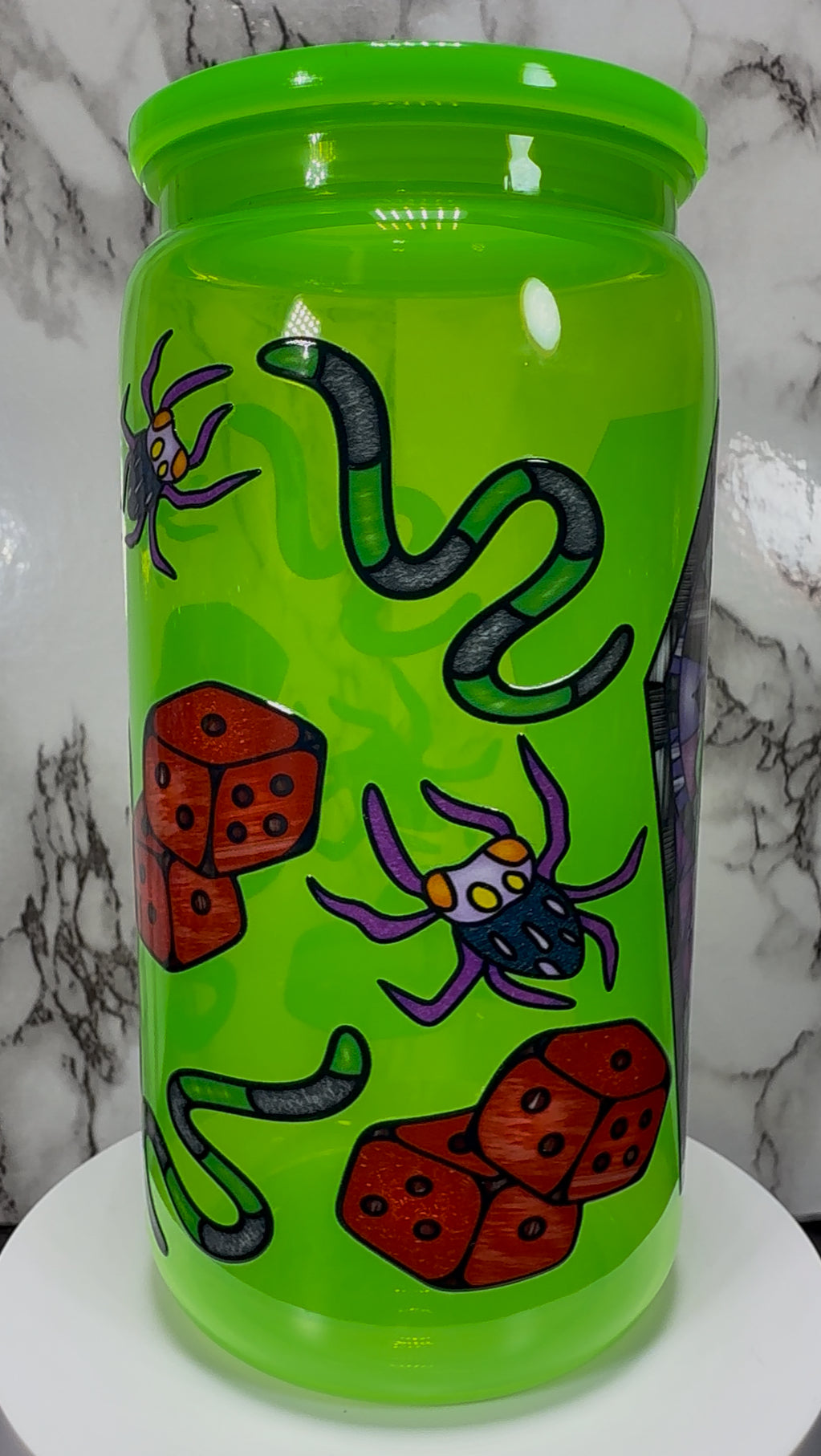 Oogie Boogie UVDTF on a bright green PLASTIC beer can cup