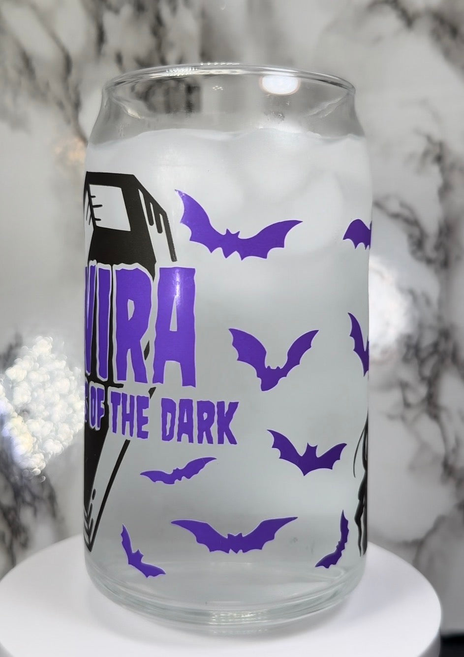 Elvira color changing black, purple and red color changing permanent vinyl on a libbey beer can glass