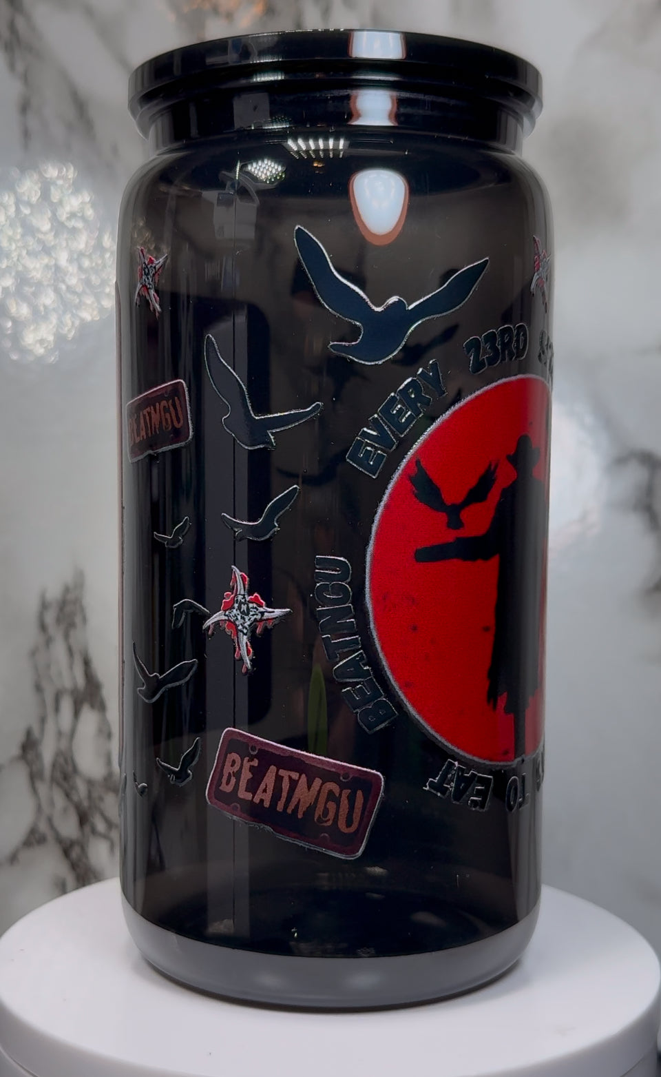 Jeepers Creepers UVDTF on a PLASTIC black beer can cup