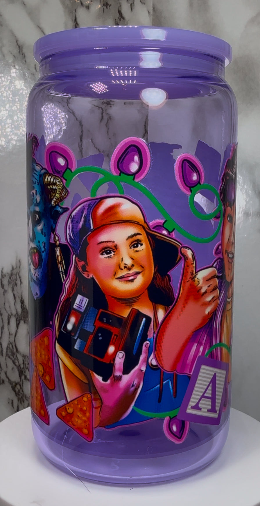 Little Monsters UVDTF on a purple beer can glass