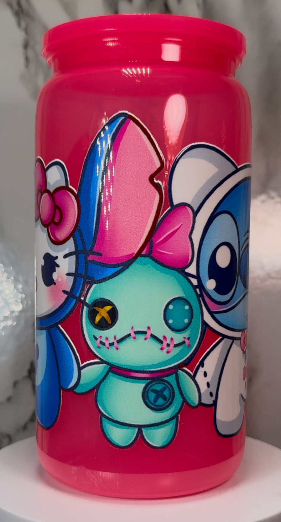 Hello Kitty-Stitch Mash Up UVDTF on a hot pink plastic beer can cup