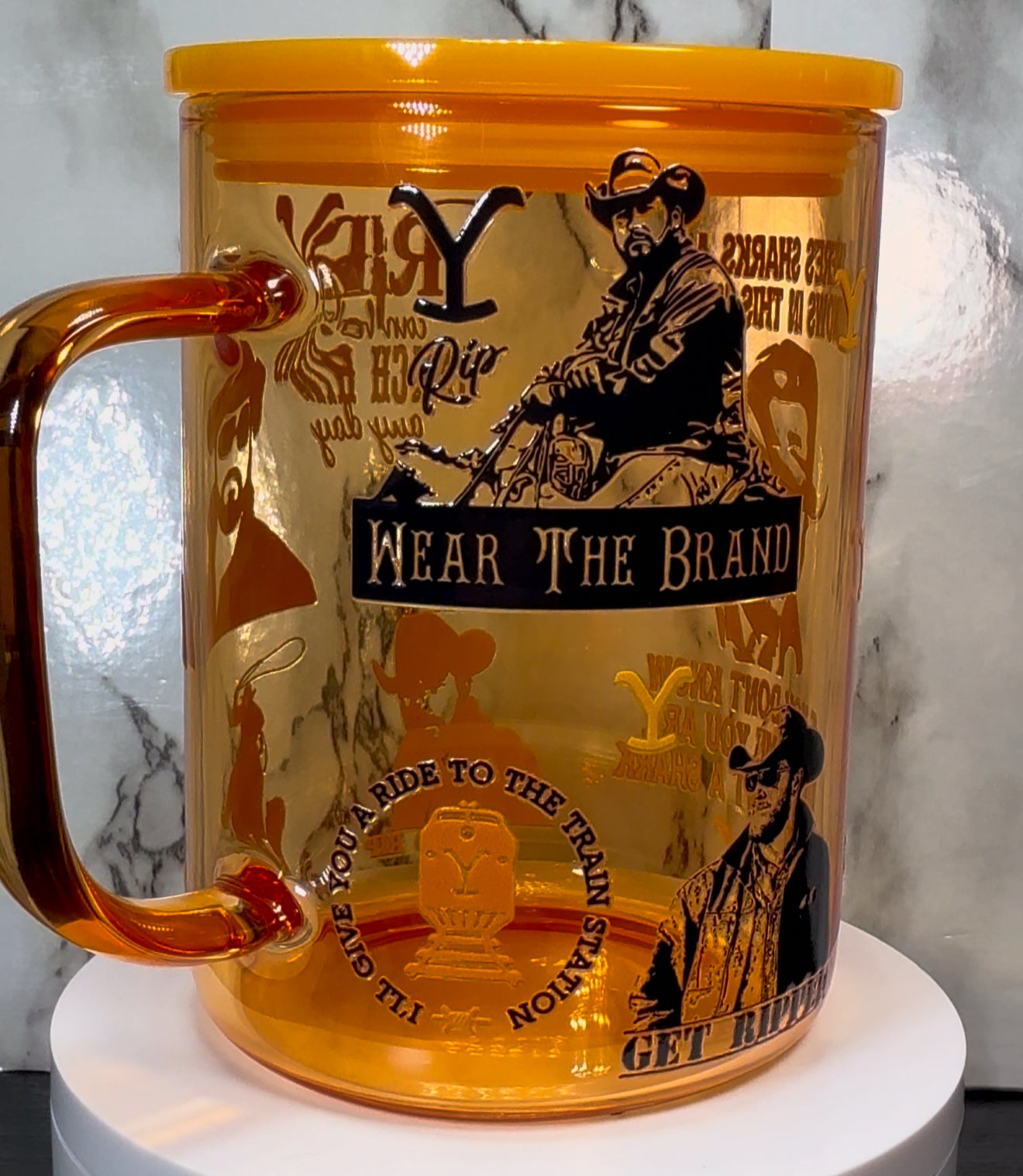 Yellowstone Rip UVDTF on a yellow 17oz glass mug