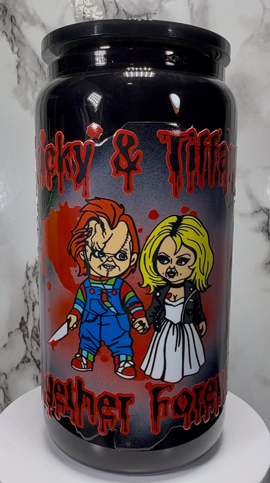 Chucky & Tiffany UVDTF on a black beer can glass
