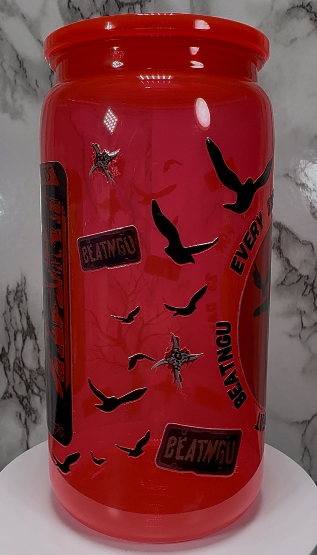 Jeepers Creepers UVDTF on a bright red PLASTIC beer can cup
