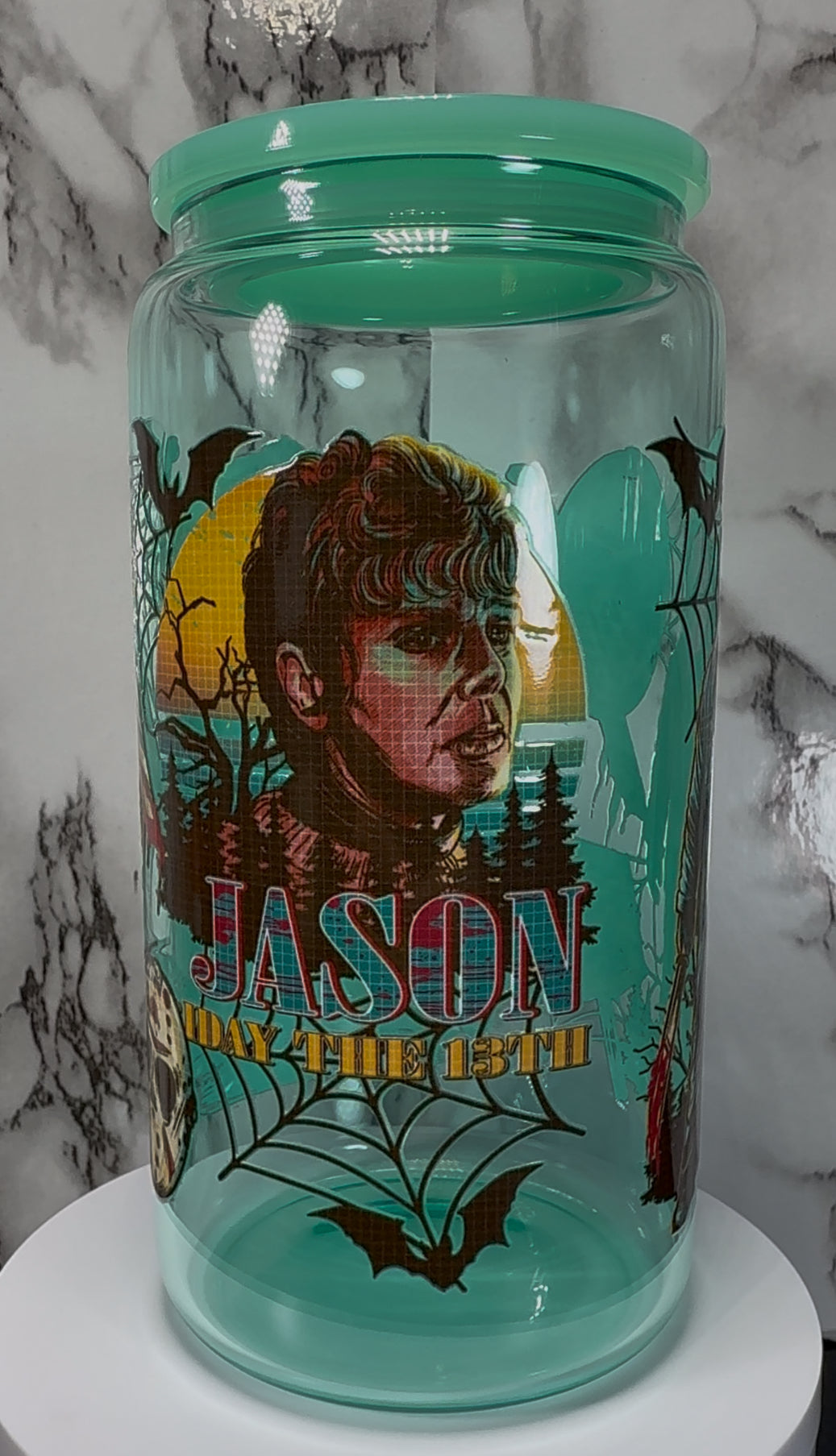 Friday the 13th Jason Voorhees UVDTF on a teal beer can glass