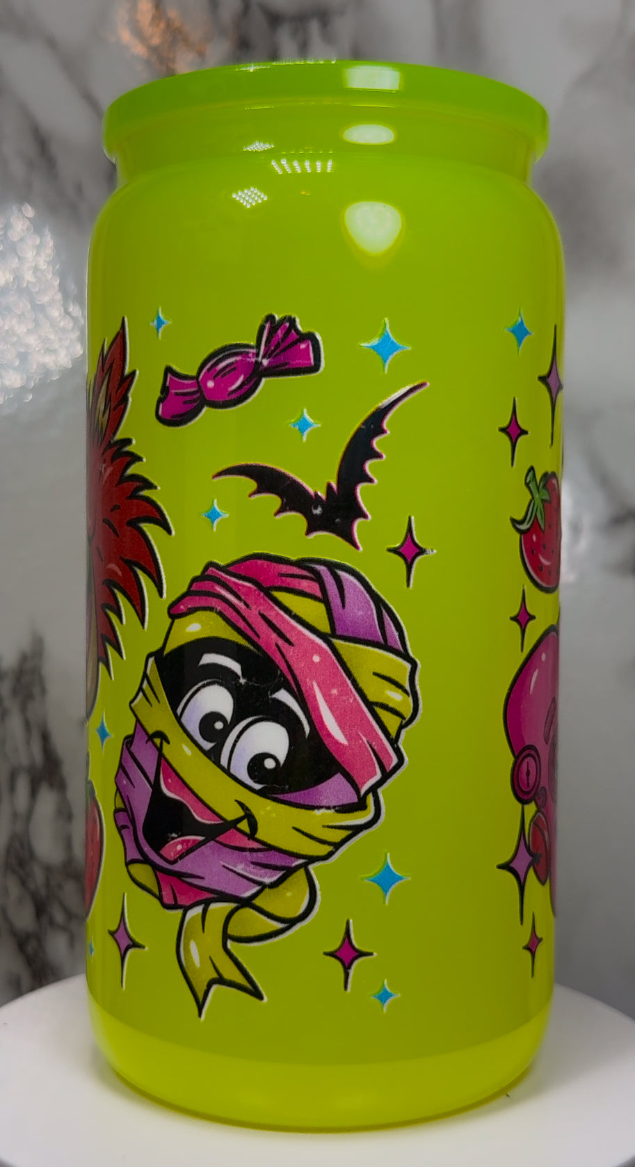 Monster Cereal UVDTF on a bright yellow beer can glass